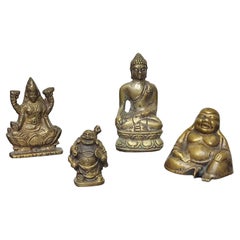 Juego de cuatro esculturas en miniatura de Buda de latón vintage