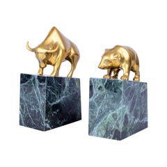 Vintage Brass Bull and Bear Bookends on Green Marble Base, a Pair