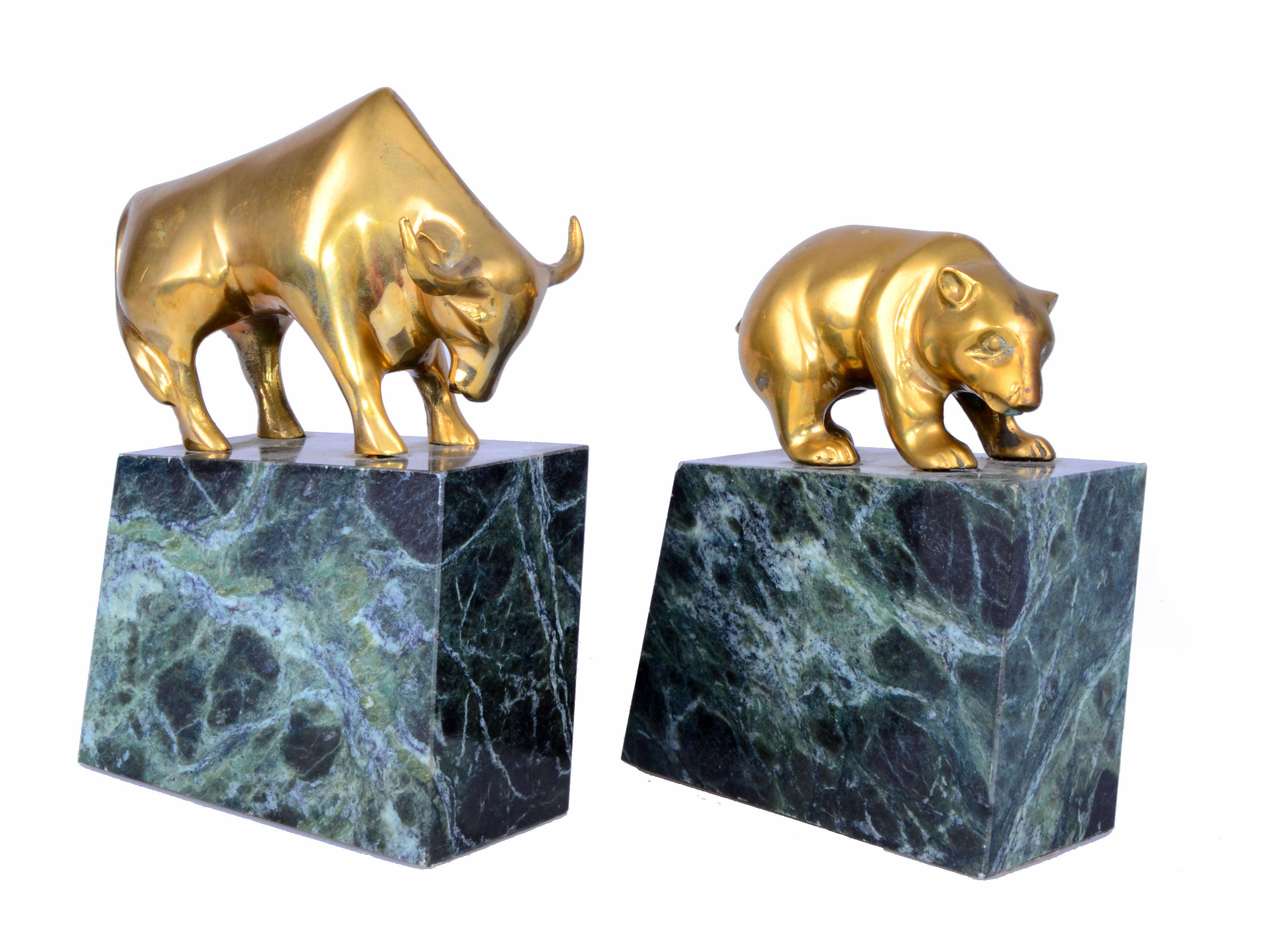 Heavy brass bull and bear bookends on green marble bases. No markings.
Note: The aged brass shows a nice patina.
Dimensions bear: Length 5 inches, width 2.5 inches, height 7 inches.