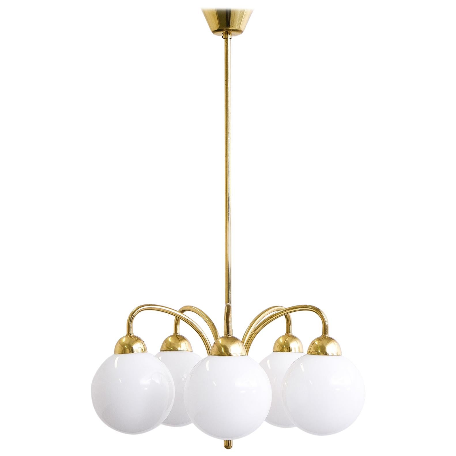 Pair of Brass Angular Chandeliers with Glass Globes For Sale at 1stDibs