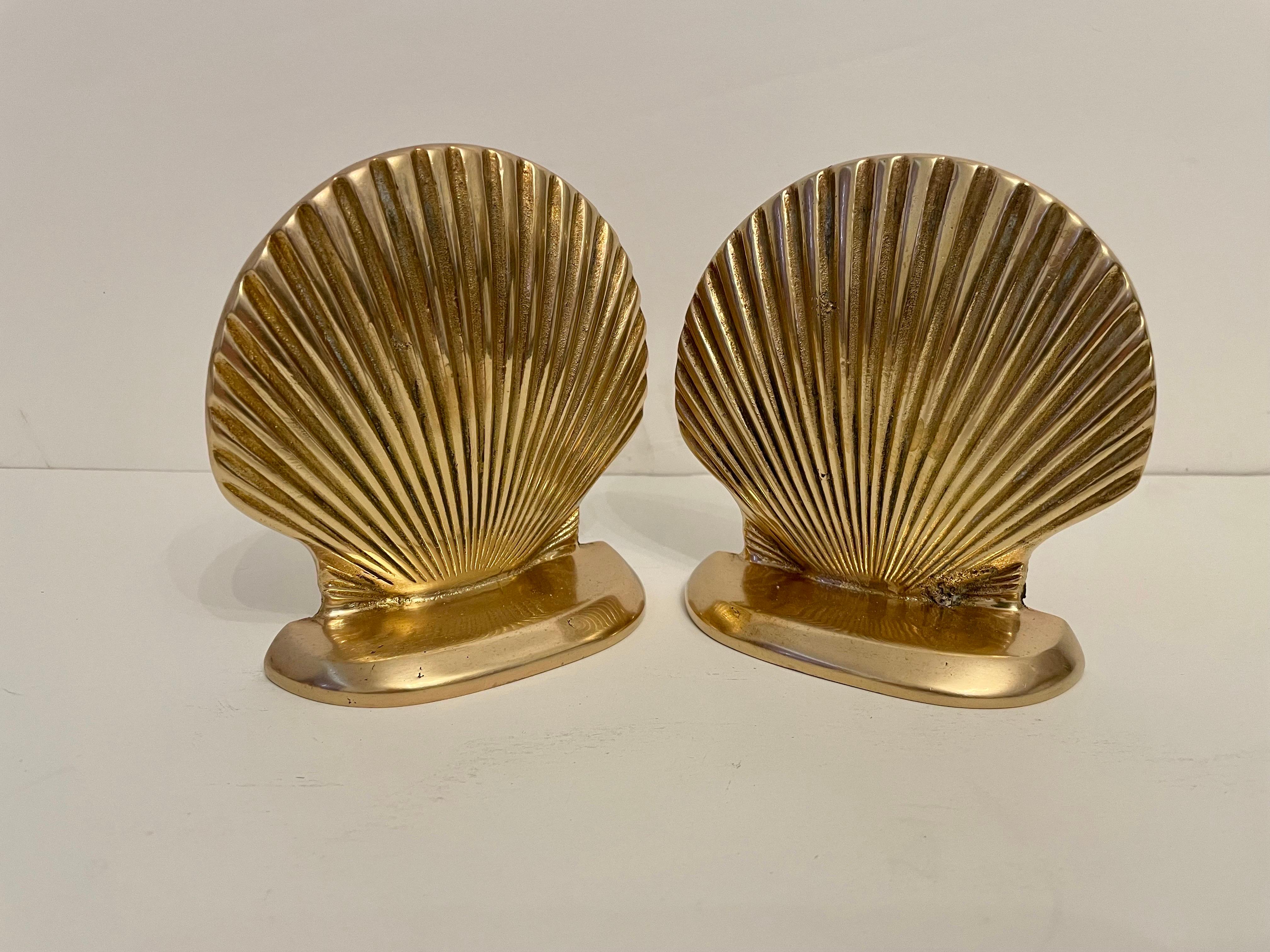Vintage clam shell seashell bookends. Good condition. Has nice size to hold a stack of books. Great for your beach house! Any dark areas are reflection only. Same day shipping!