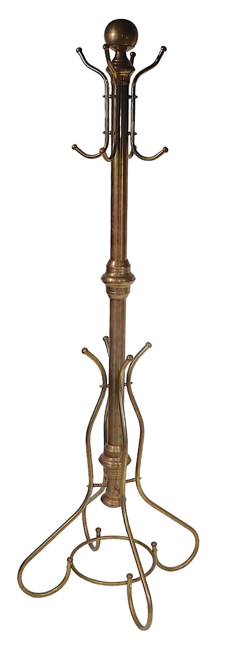 American Vintage Brass Coat Tree Rack Having Eight Hooks at the Top  For Sale