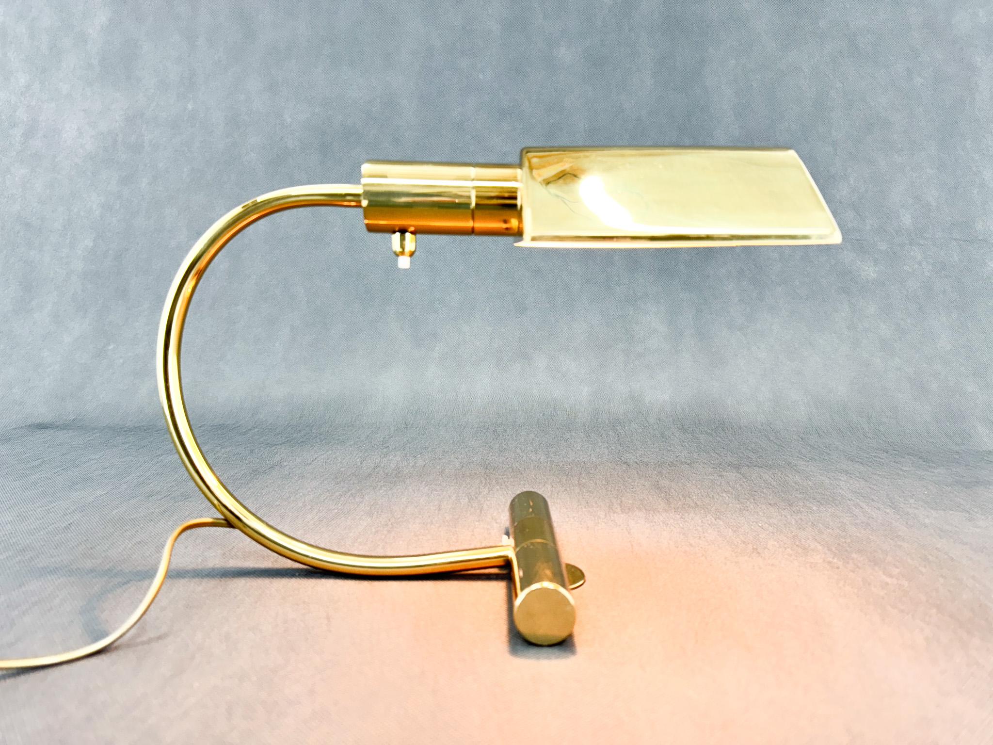 Vintage table or desk lamp made of brassed metal. Produced in Belgium in the 1970's. Bulb: 1 x E14. US adapter included.

