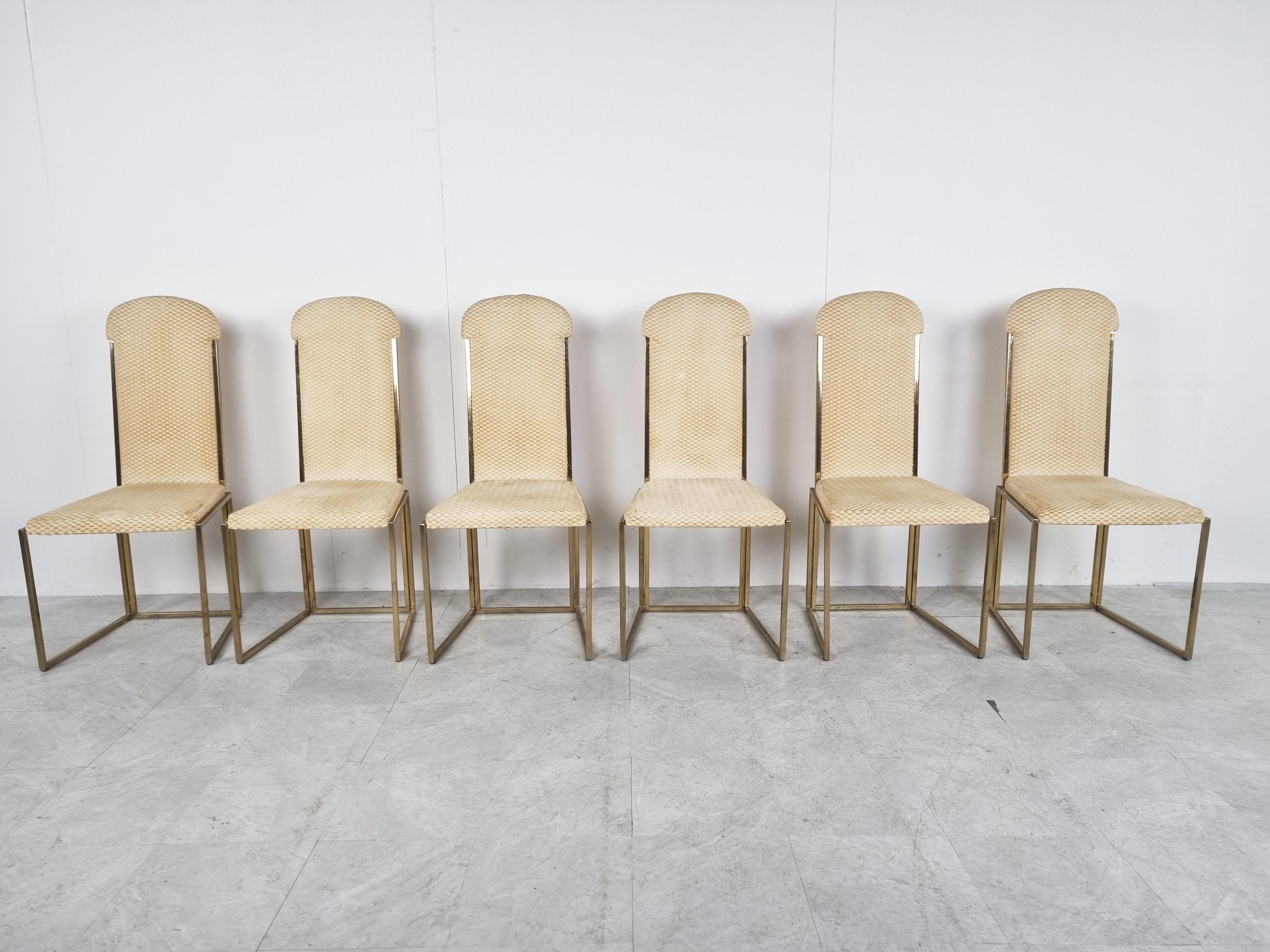 Set of six elegant high back dining room chairs manufactured by Belgochrom.

The chairs consist of fine brass frames upholstered with the original fabric which has a beige/brown checquered motive.

They look good in modern day