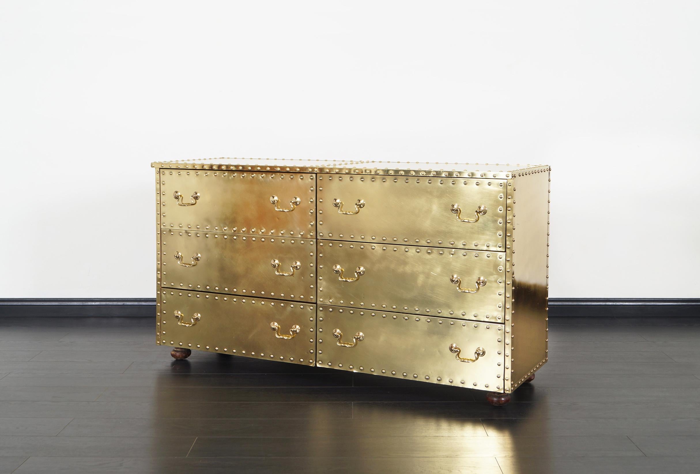 Vintage brass dresser designed by Sarreid Ltd.