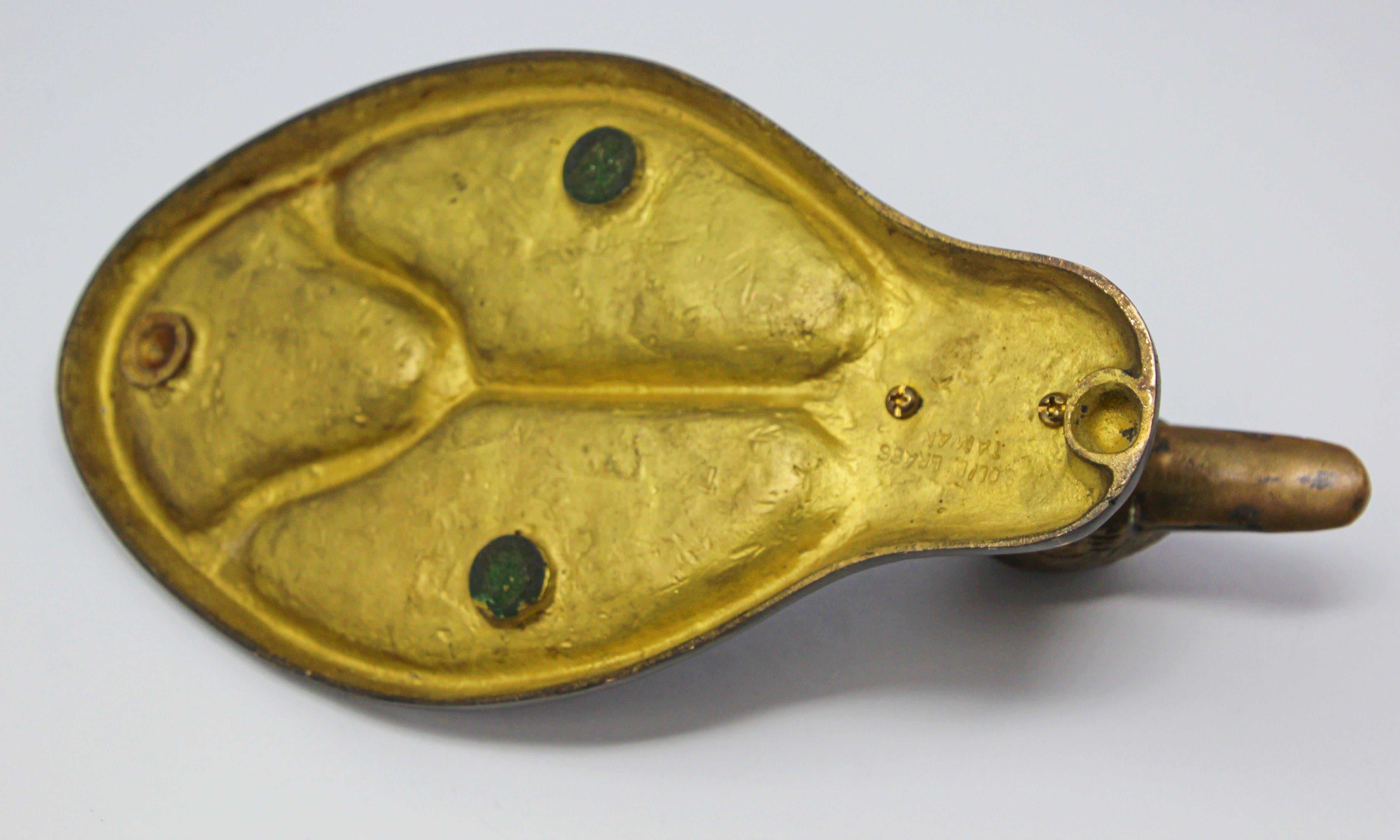 antique brass ducks