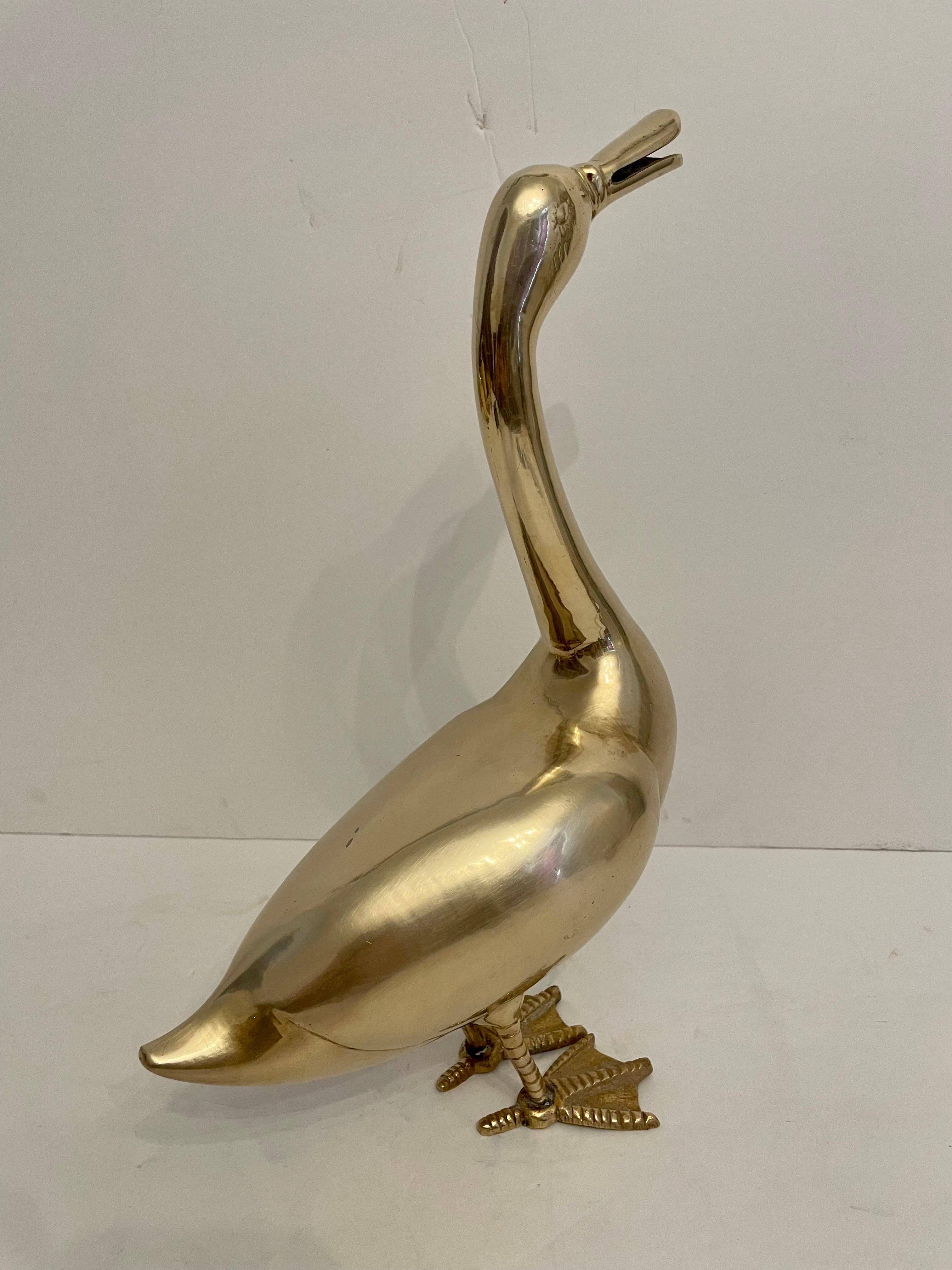 Vintage large brass duck. Measures 10