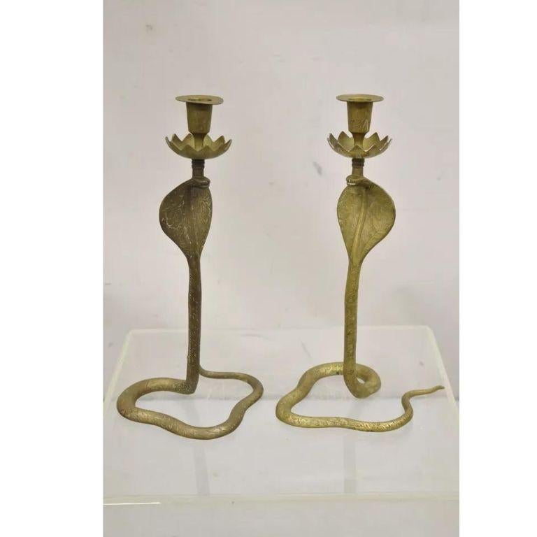 Vintage Brass Figural Hollywood Regency Coiled Cobra Snake Candlesticks - a Pair. Circa mid 20th century Measurements: 13.5