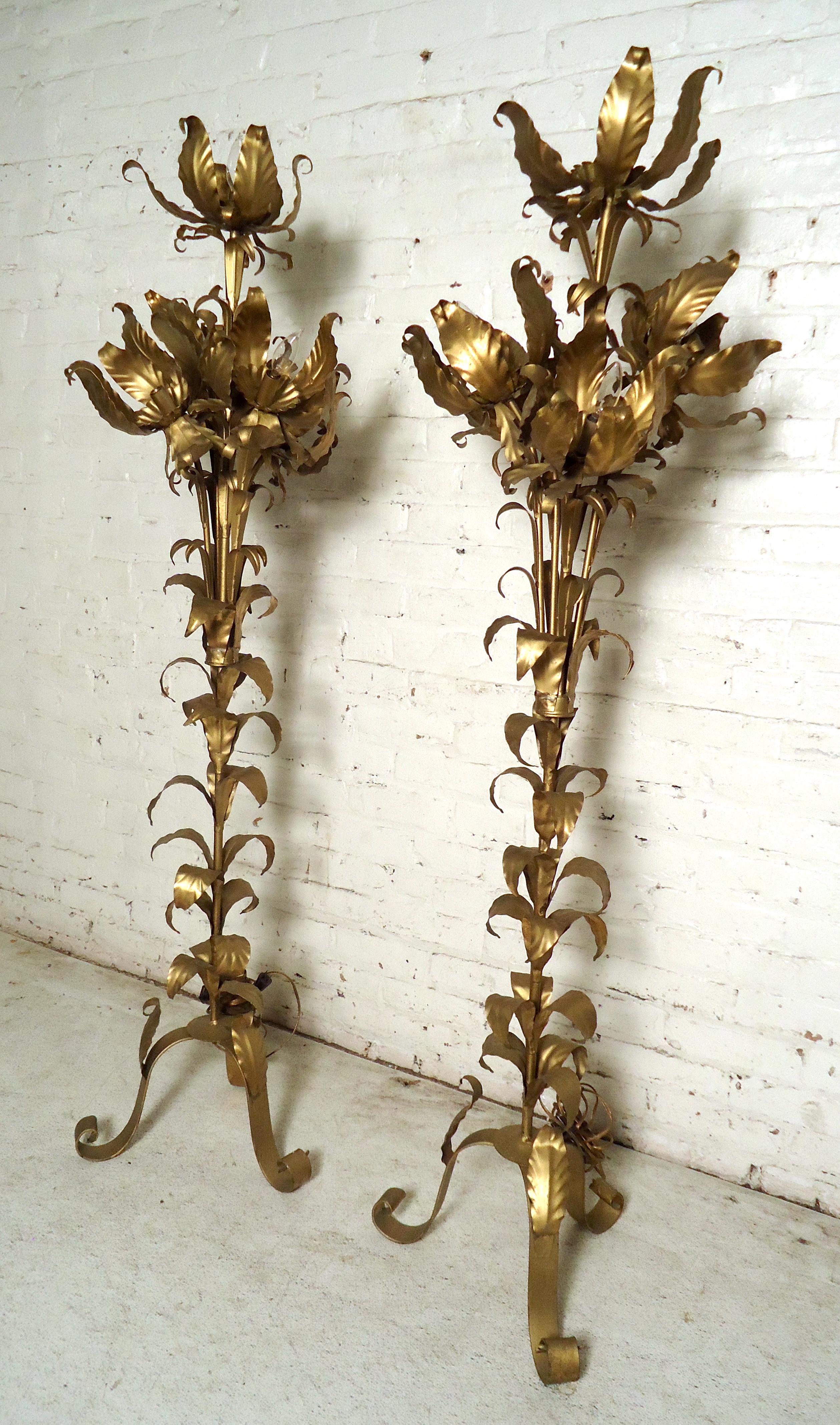 Unique pair of vintage modern floor lamps featuring bent metal leaves throughout in a brass finish 
(Please confirm item location - NY or NJ with dealer).