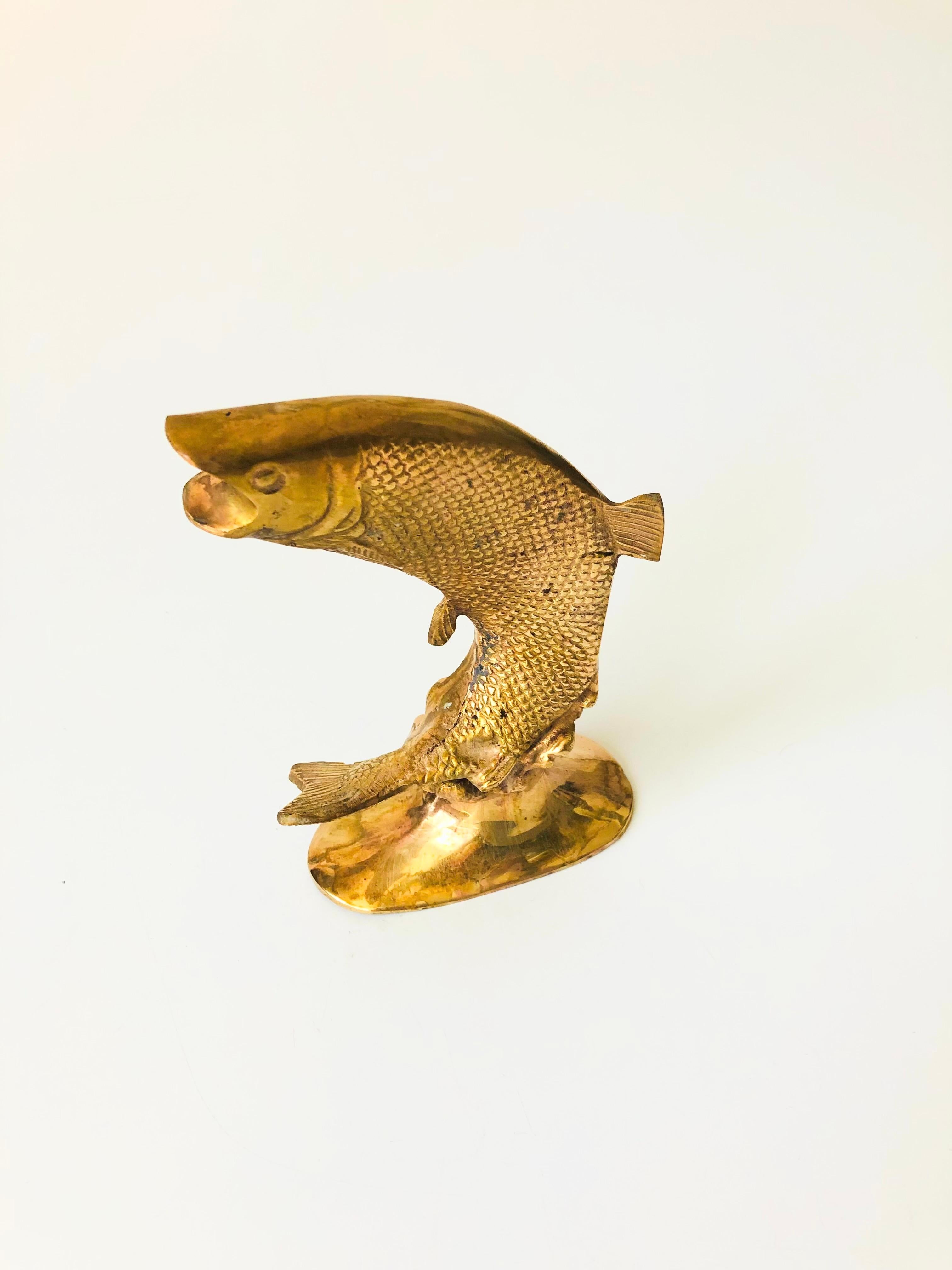 A vintage brass fish. Great realistic detailing formed into the brass.
 