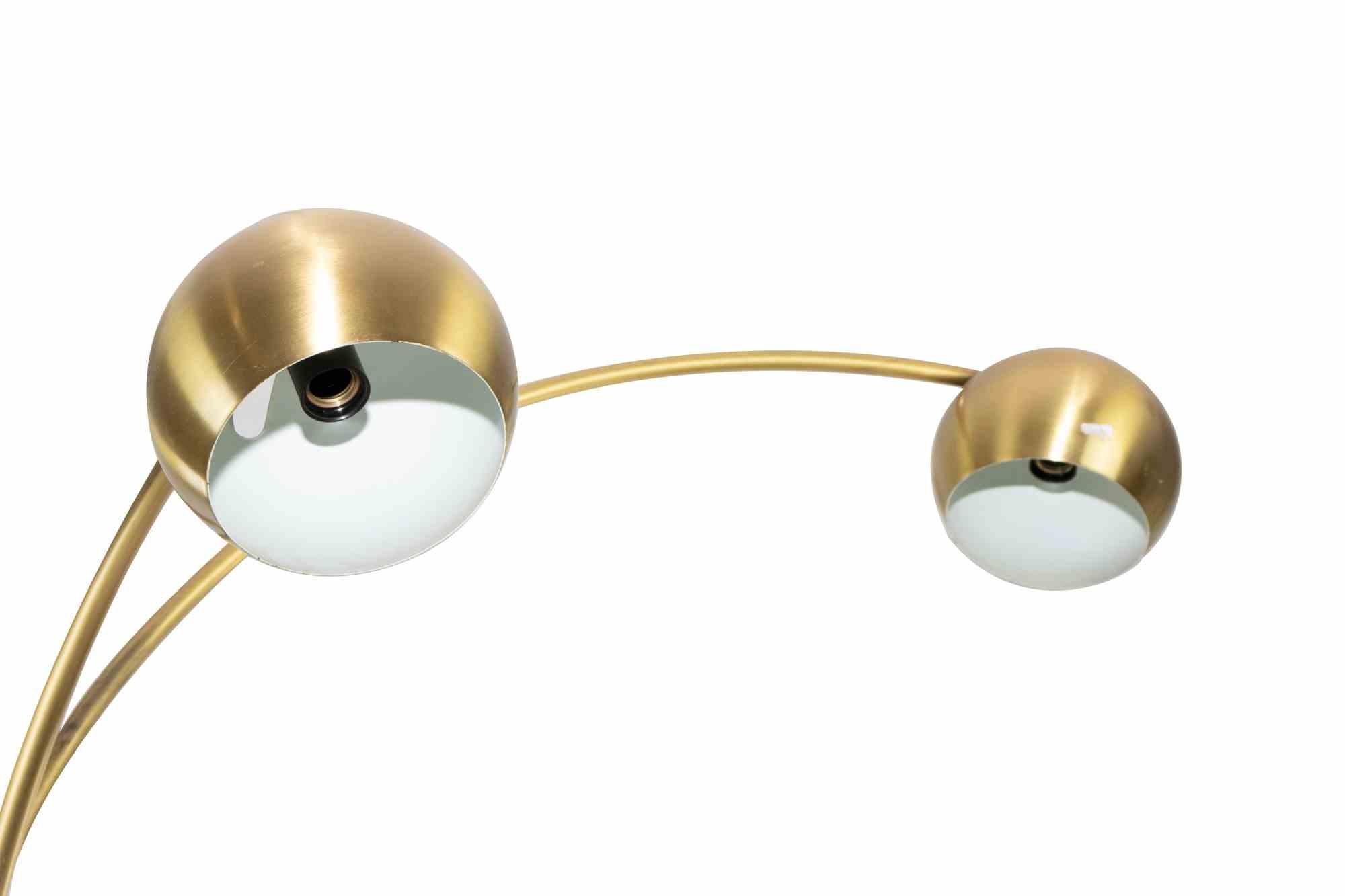 Vintage Brass Floor Lamp Attributed to Goffredo Reggiani, 3 arms with tilting lampshades.

Vintage lamp from 1970s with marble base. 

Maximum extension lenght 175x75 cm; minimum extension lenght 111x35 cm.

Good conditions except for some scratches