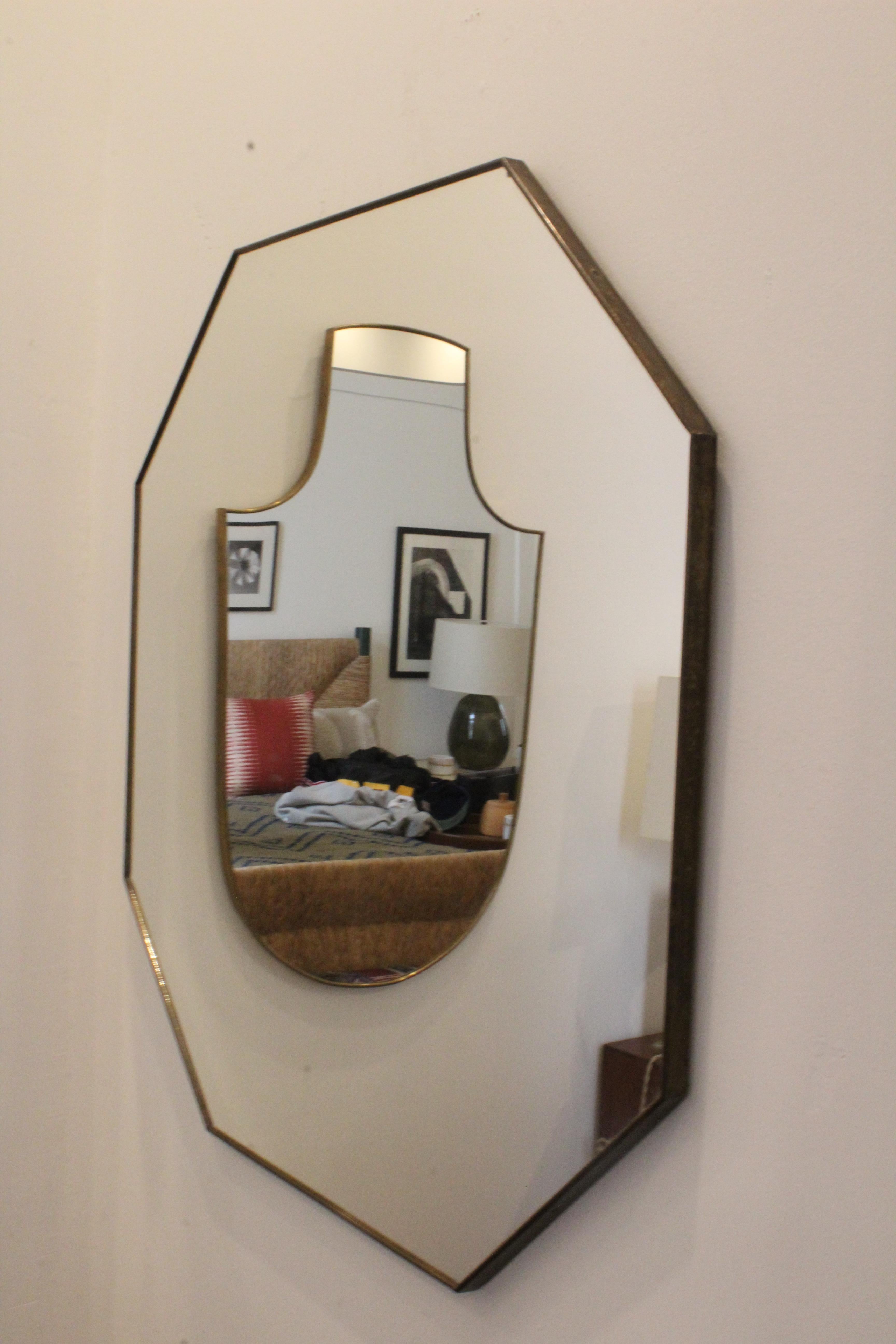 Vintage brass framed mirror, Italy, 1950s. In good condition with patina to the brass frame. Original mirror.