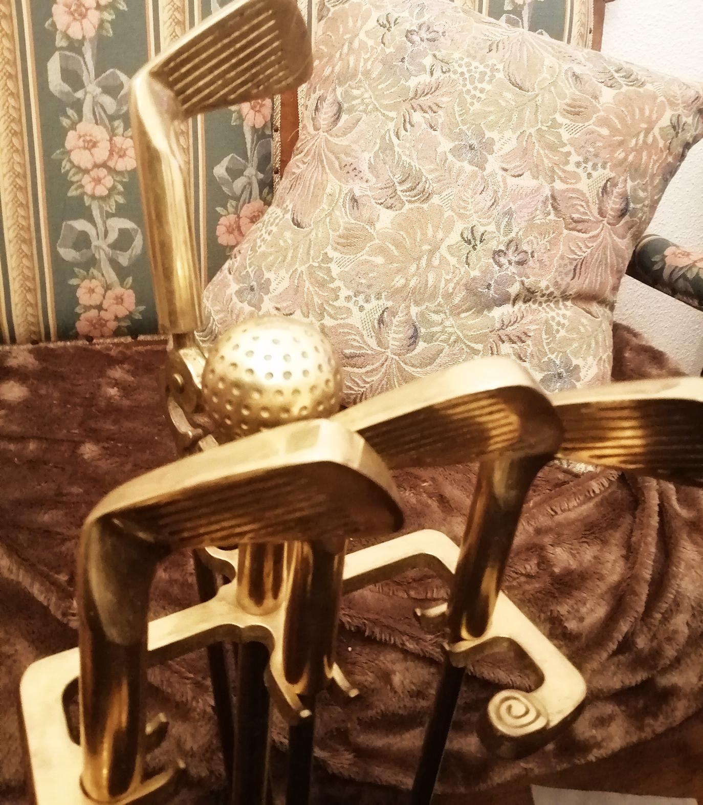 Fireplace tools, brass shaped like Golf Sticks, French 20th Century

Vintage midcentury brass golf motif fireplace tool set, consisting of five pieces. 

Fireplace Tool golf motifs Set ideal for the fireplace of your country house or chalet of