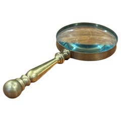 Loupe à manche en laiton