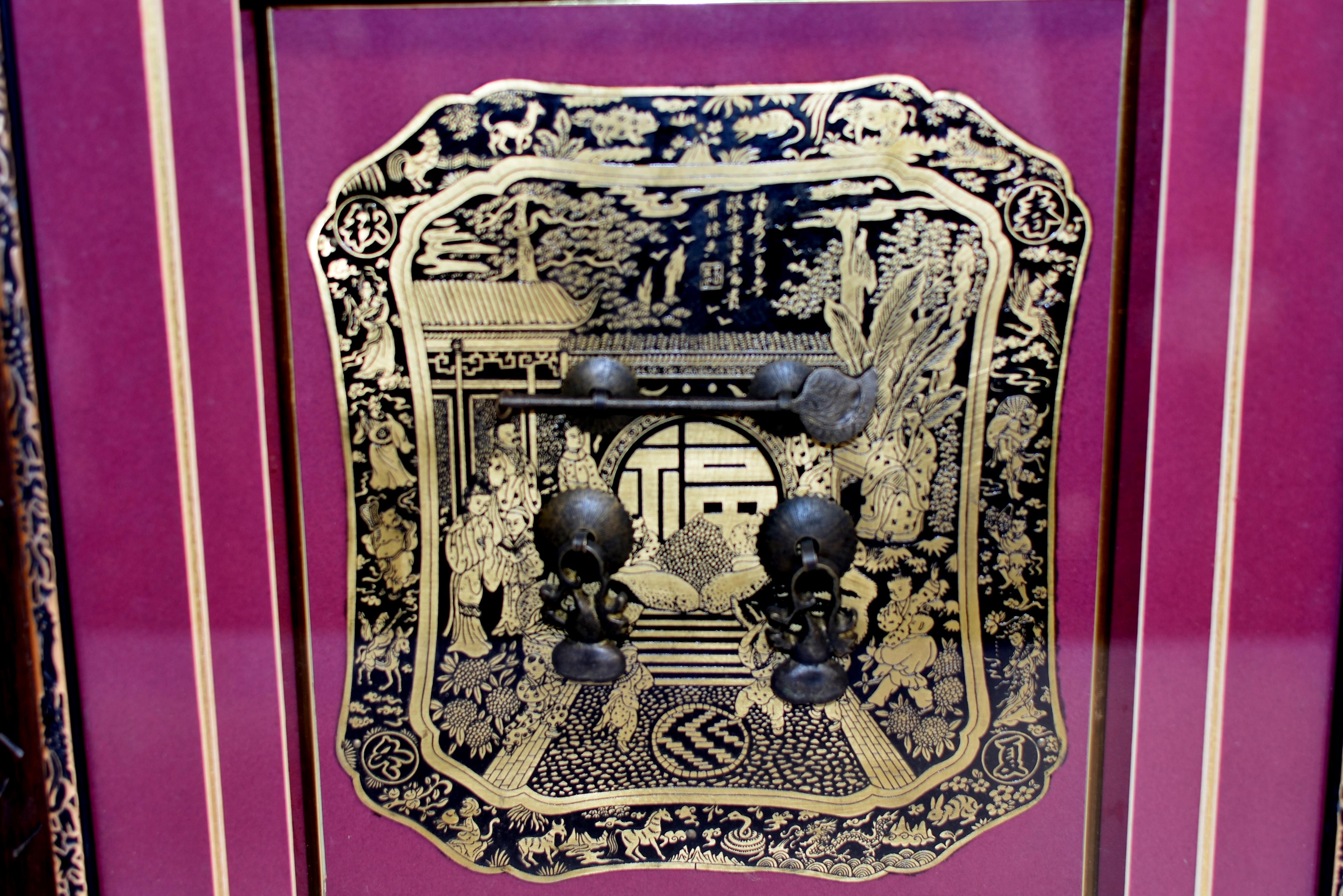 A beautiful vintage shadowbox of solid brass hardware. The exceptionally large door plate is prominently featured, displaying great details of a finely engraved good fortune theme. The main scene is a family compound, with the patriarch on the right