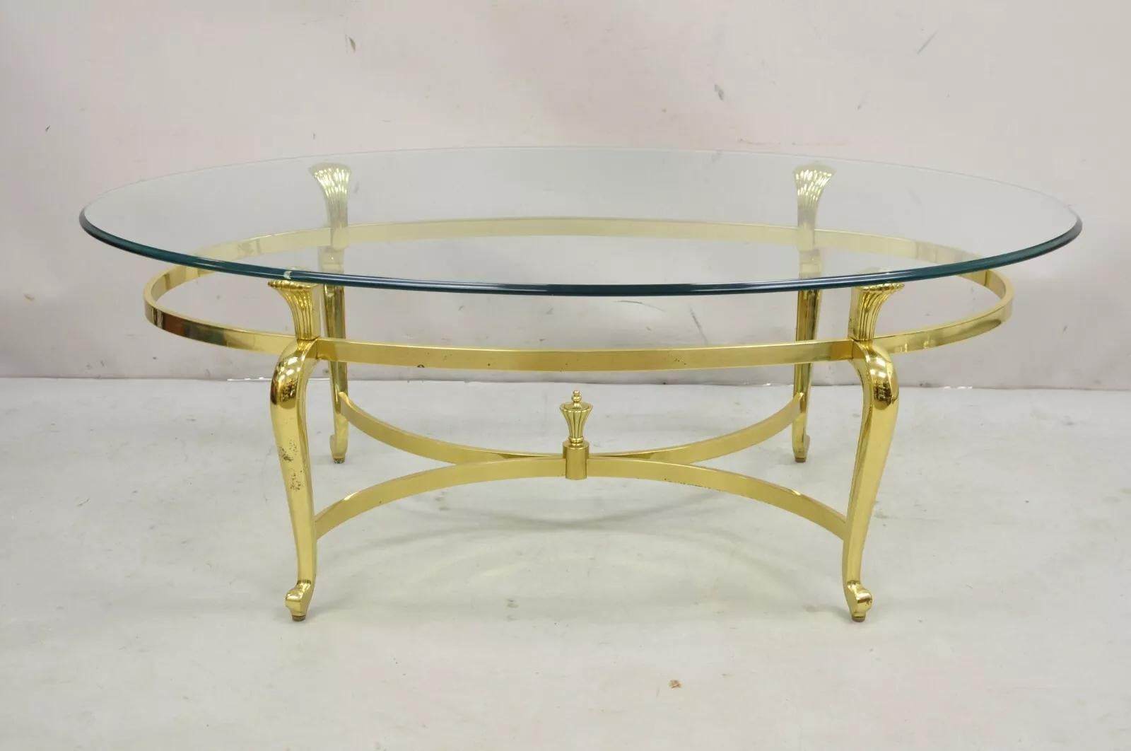 Vintage Brass Hollywood Regency Oval Glass Top Cabriole Leg Coffee Table. Circa Late 20th Century. Measurements: 17.5
