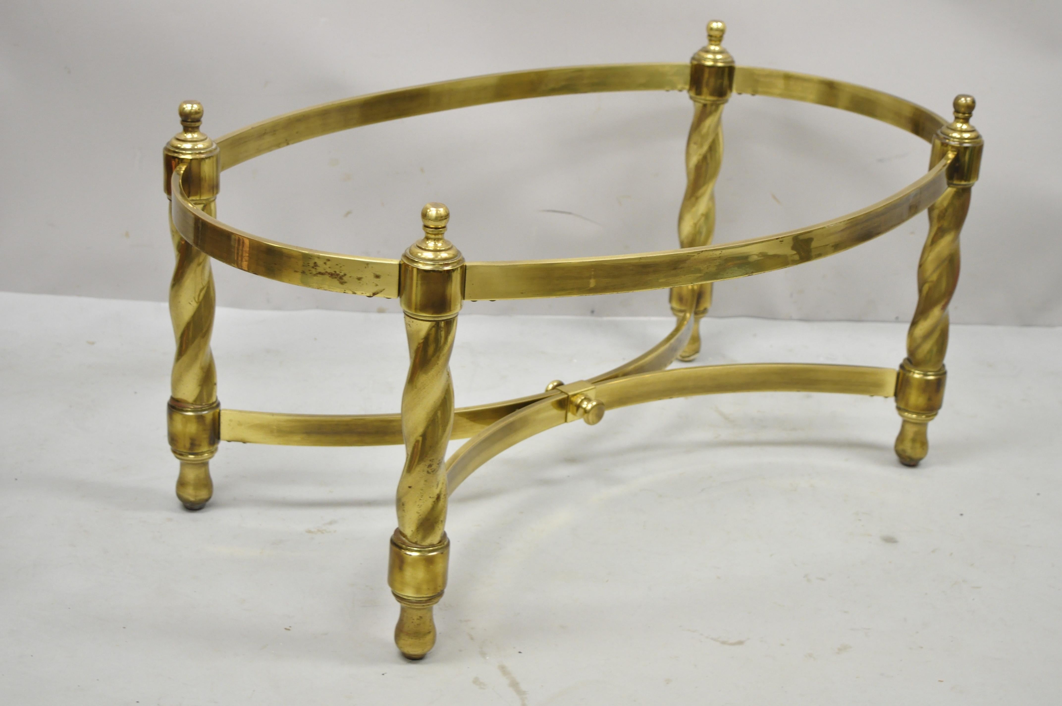 Vintage brass Hollywood Regency spiral twist oval coffee table base attr. Mastercraft. Item features spiral turned legs, stretcher base, oval shape, brass construction, very nice vintage item, quality Italian craftsmanship, great style and form,
