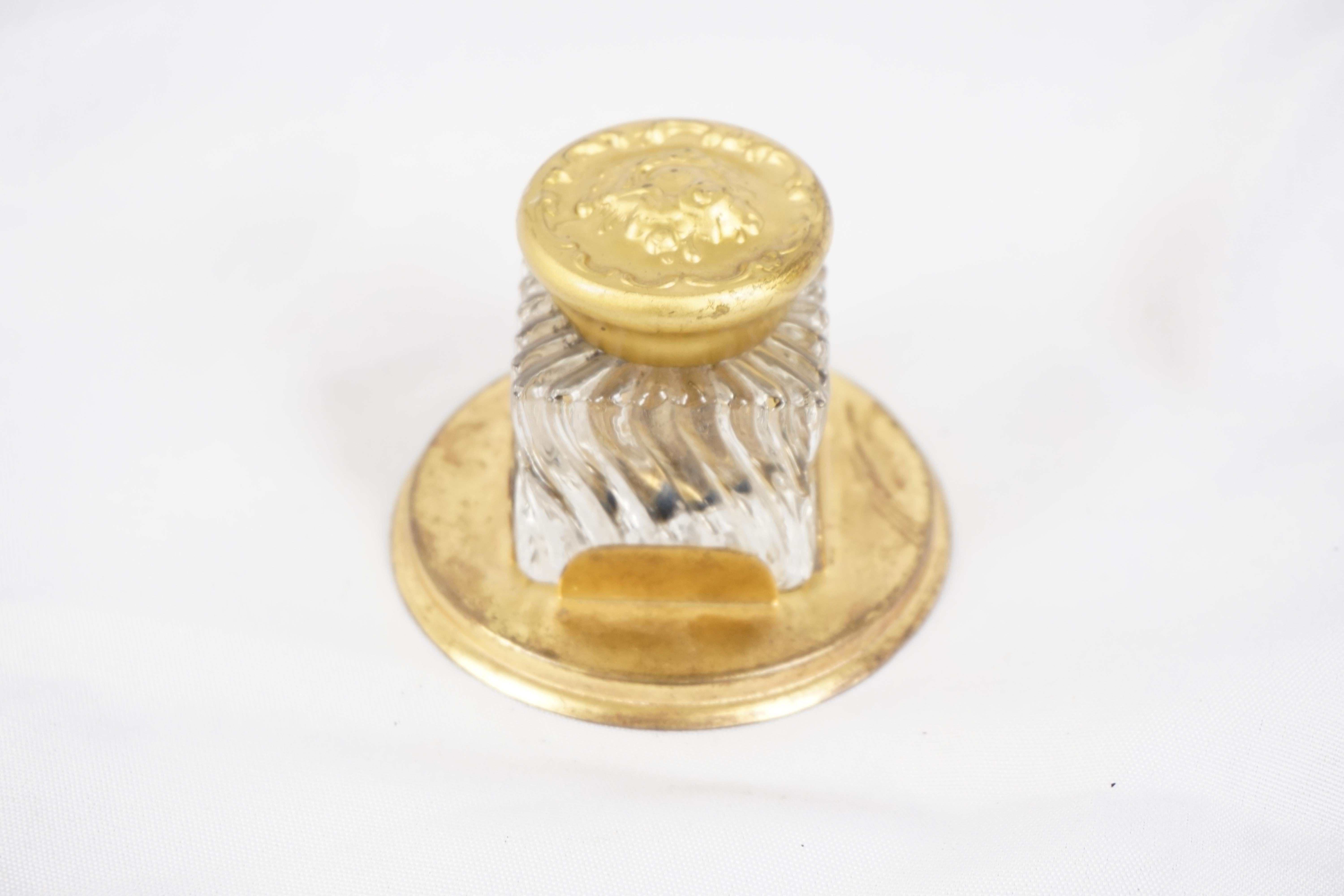 Vintage Brass Inkwell, Single Inkstand, England 1930, H305

England 1930
Single Inkwell With Brass Fitting And Cover
Sitting In A Brass Base 

H305

Measures: 3