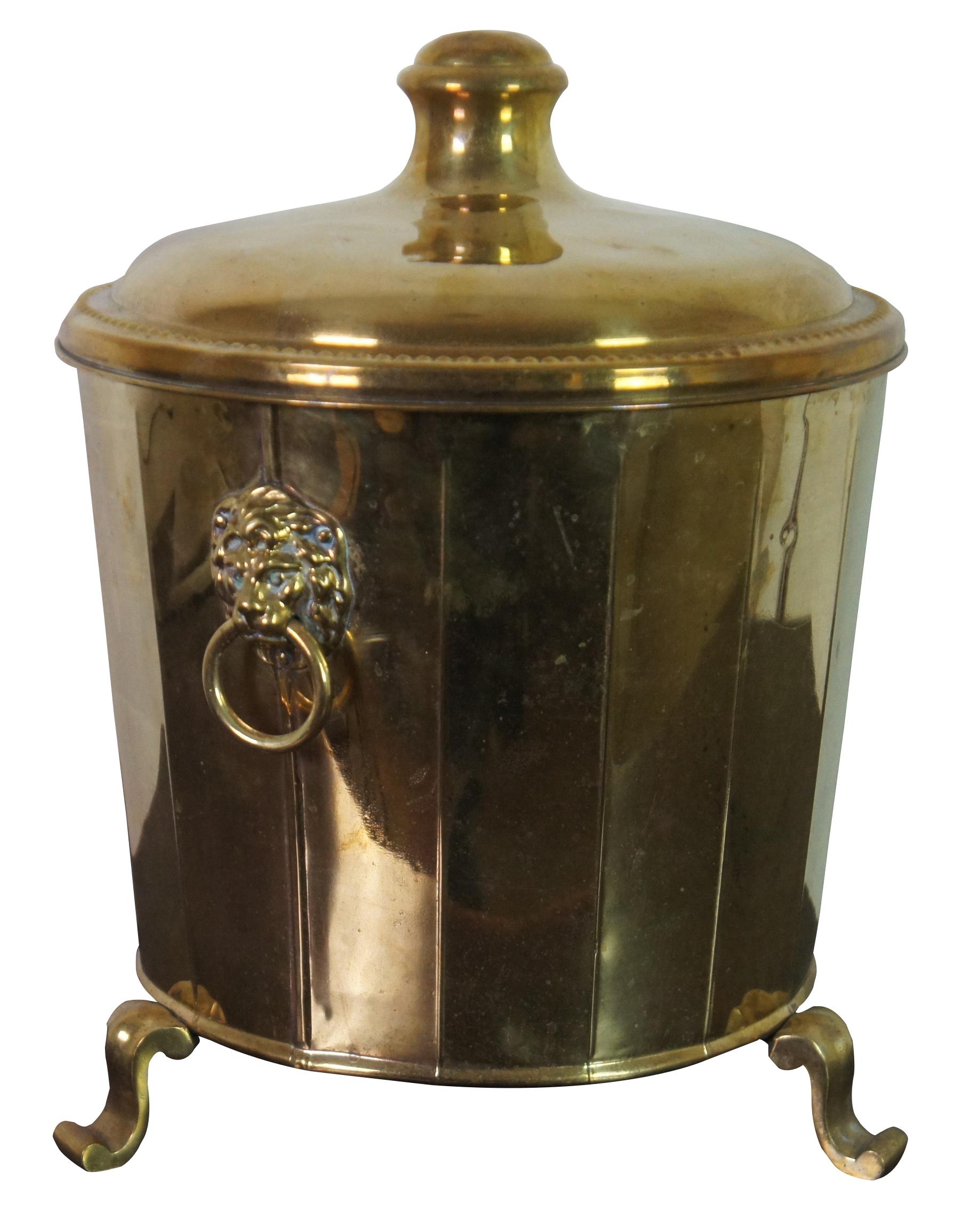 Vintage Empire style brass coal bin with scrolled feet, lion’s head handles, lid, and handled liner.

Provenance : Jerome Schottenstein Estate, Columbus Ohio. Jerome was was an American entrepreneur and philanthropist, co-founder of Schottenstein