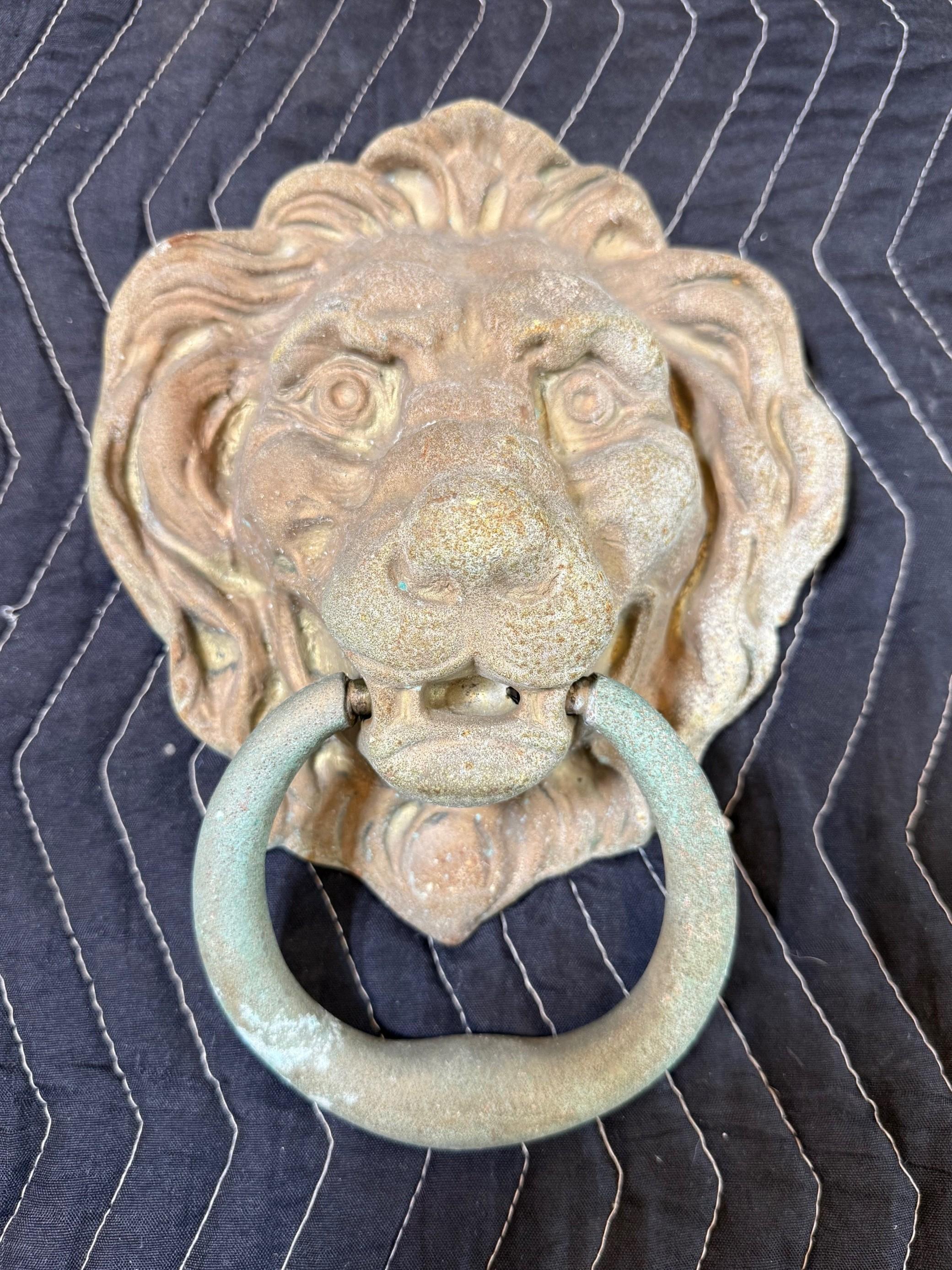 Vintage brass lion head door knocker with a great weathered patina.
This vintage brass lion head door knocker is a eye-catching piece for any door. The fantastic patina adds to its charm, making it a standout feature for your home. Crafted from