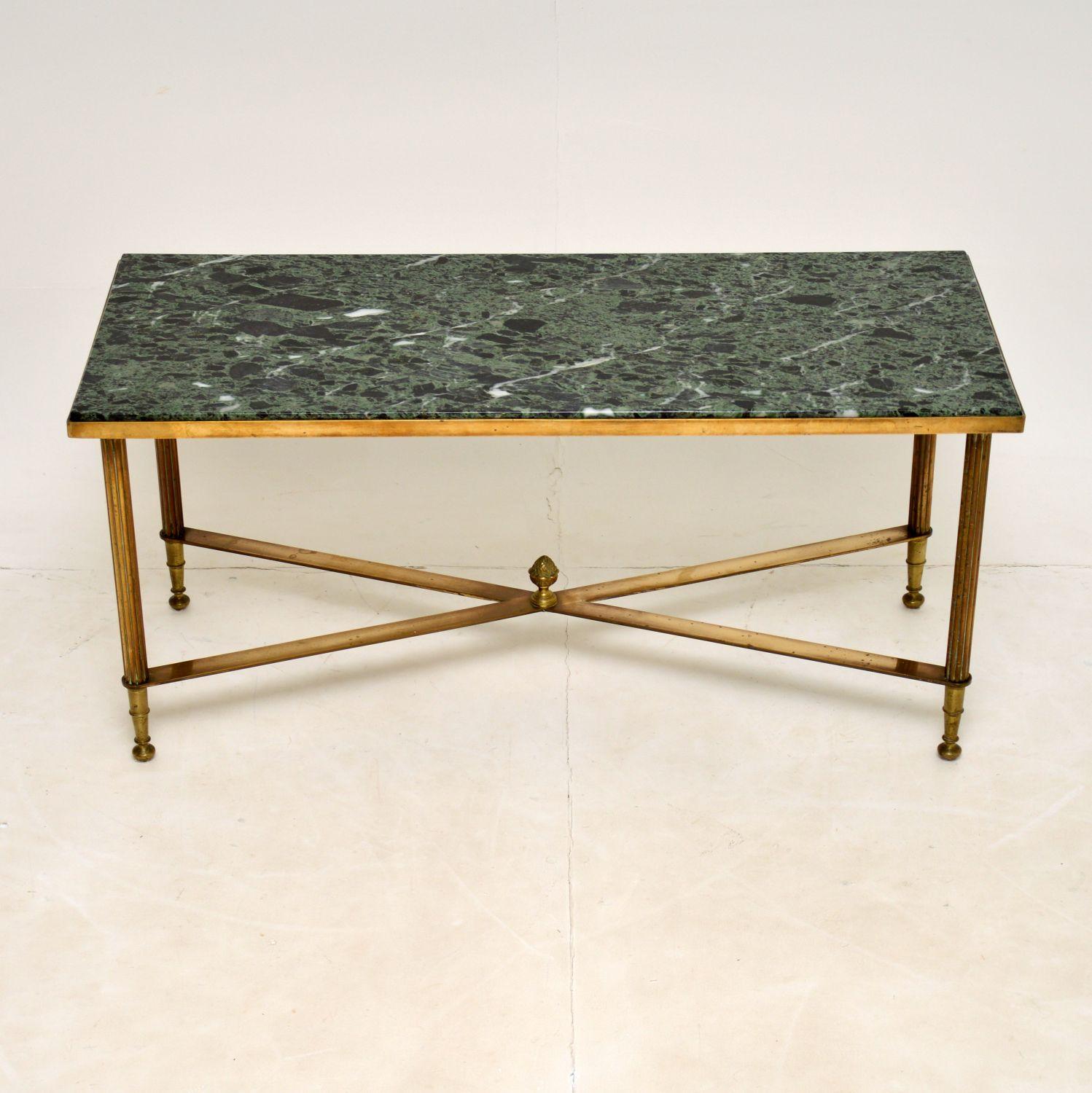 A stunning and extremely well made vintage coffee table in solid brass, with an inset marble top. This was made in France, it dates from the 1950-60’s.

The quality is absolutely superb, the solid brass frame is finely crafted with lovely detail.