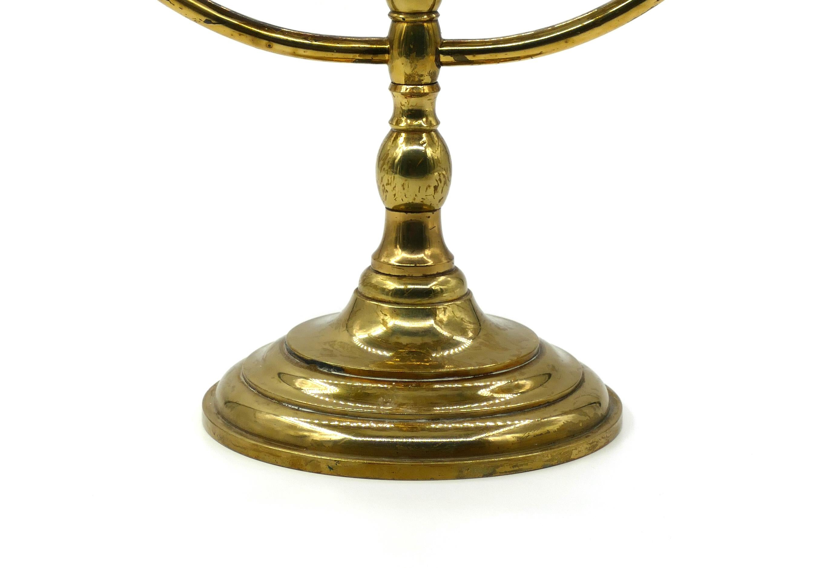 This is a Menorah brass candlestick produced in the first half of 20th century.

In very good conditions, except for some signs of the time. 

Weight: 1.6 Kgs.