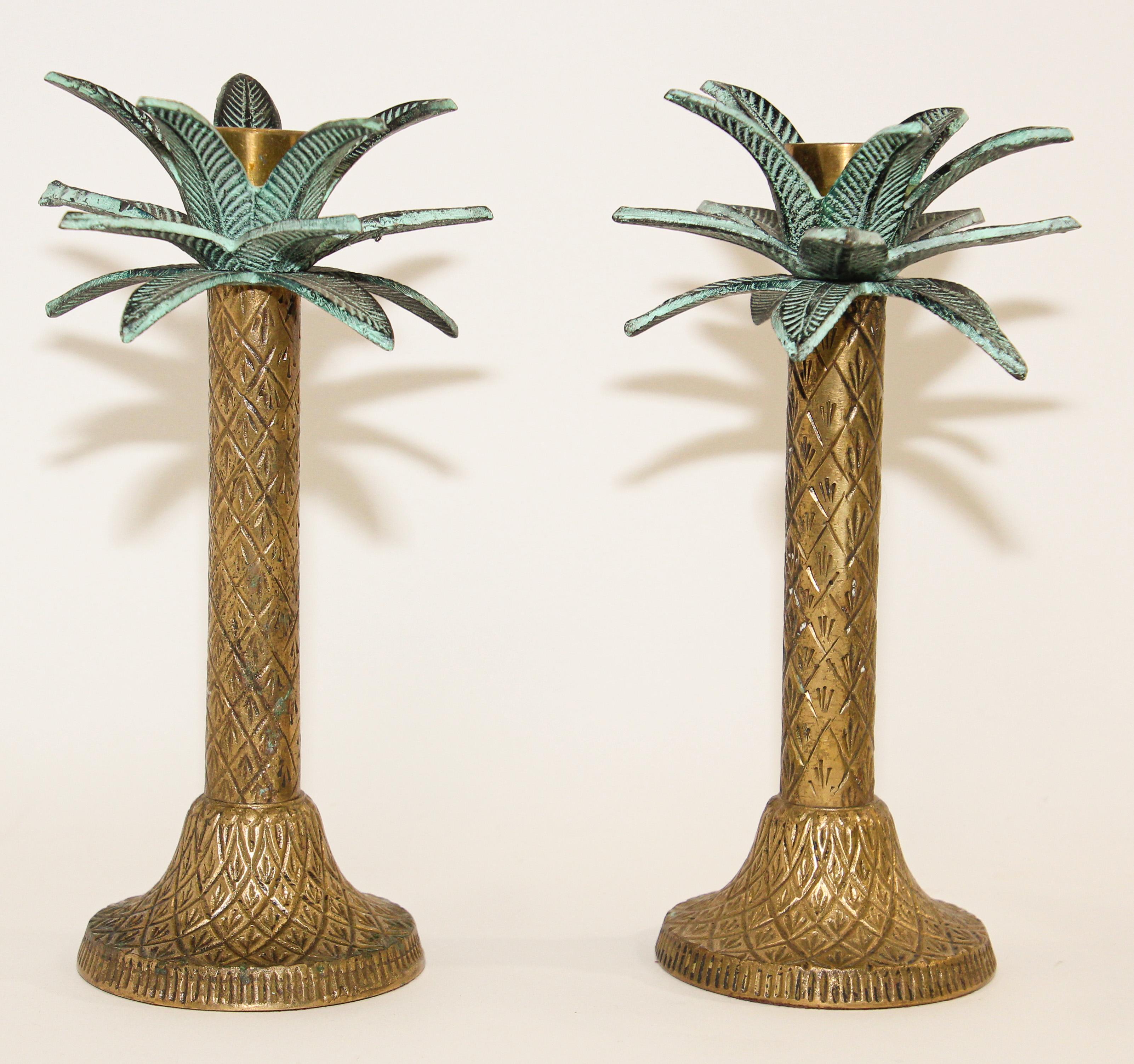 Vintage Set of two brass palm tree candlestick holders.
Gorgeous pair of brass candlestick holders.
They are as stately as the tropical palm trees they have been designed after.
Vintage, good condition, no hallmarks.
Patina consistent to vintage