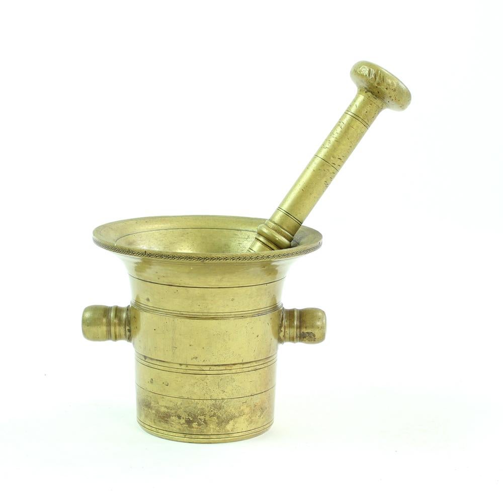Beautiful vintage pestle & mortar with charming age patina. Produced and used in Czechoslovakia in 1940s for spices and herbs. The item is made of a solid brass and is heavy. Fully functional. Some visible signs of use on the metal which just adds