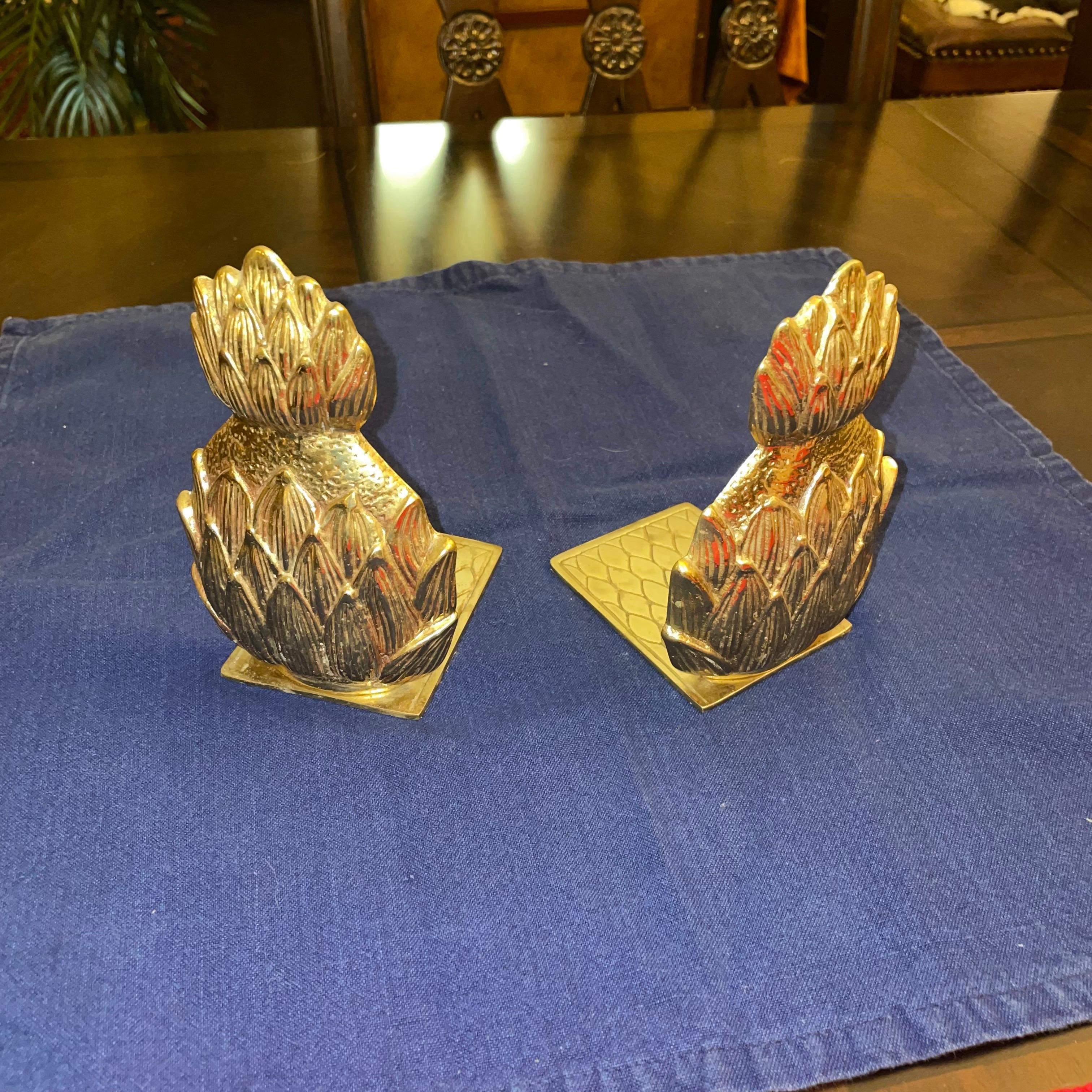 A pair of brass pineapple bookends in great condition. They both have felt bottoms so as to not scratch the surface they are on. Recently polished.