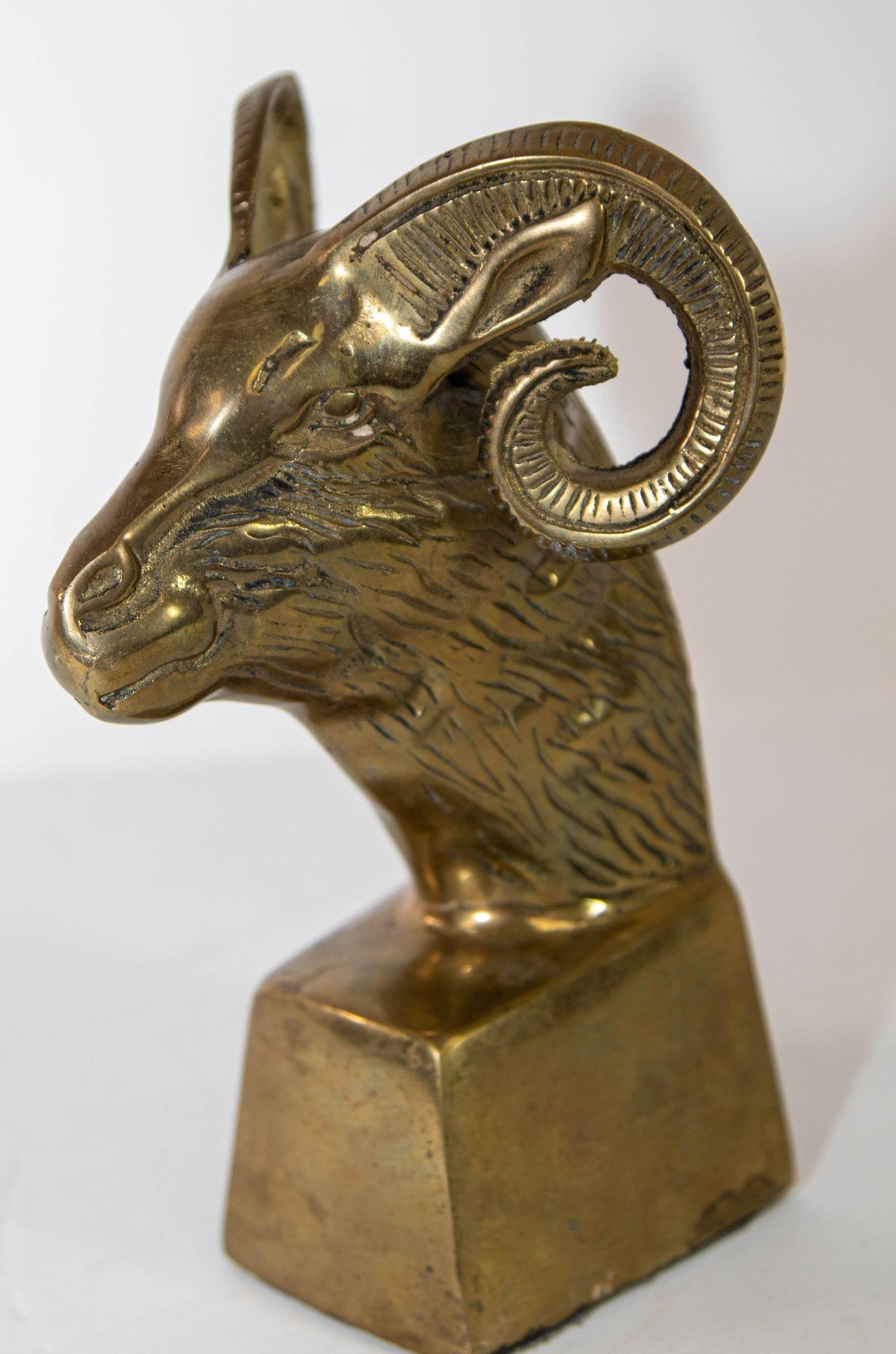 Mid-Century Modern Polished Brass Rams Head Paperweight or Single Bookend circa 1950s.
This Figurative Hollywood Regency cast brass ram bust sculpture will make an elegant addition to any space.
Large Art Deco style weighted sturdy brass paperweight
