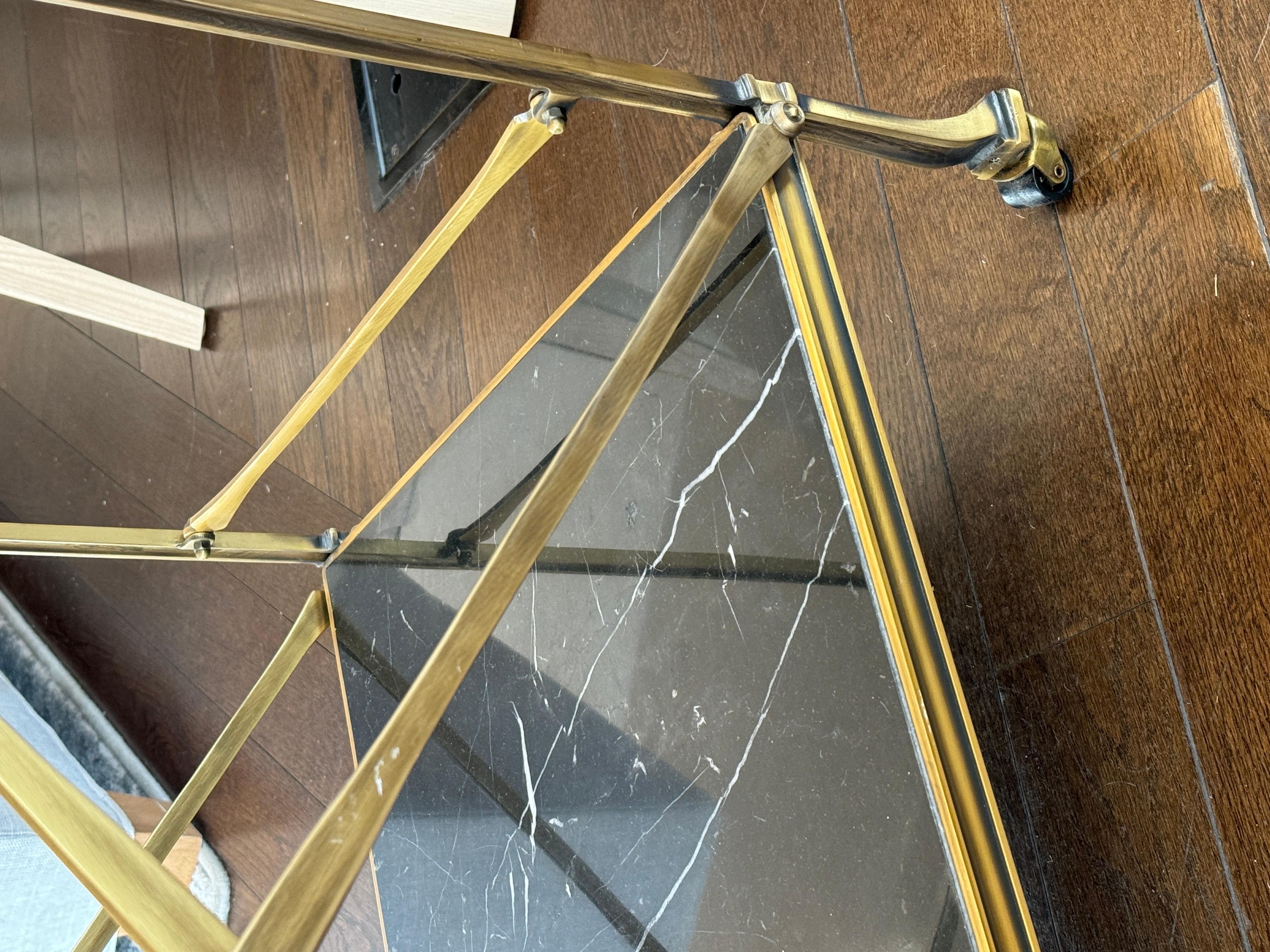 Vintage Brass Rolling Bar Cart With Black Marble Shelves In Good Condition In Bridgehampton, NY