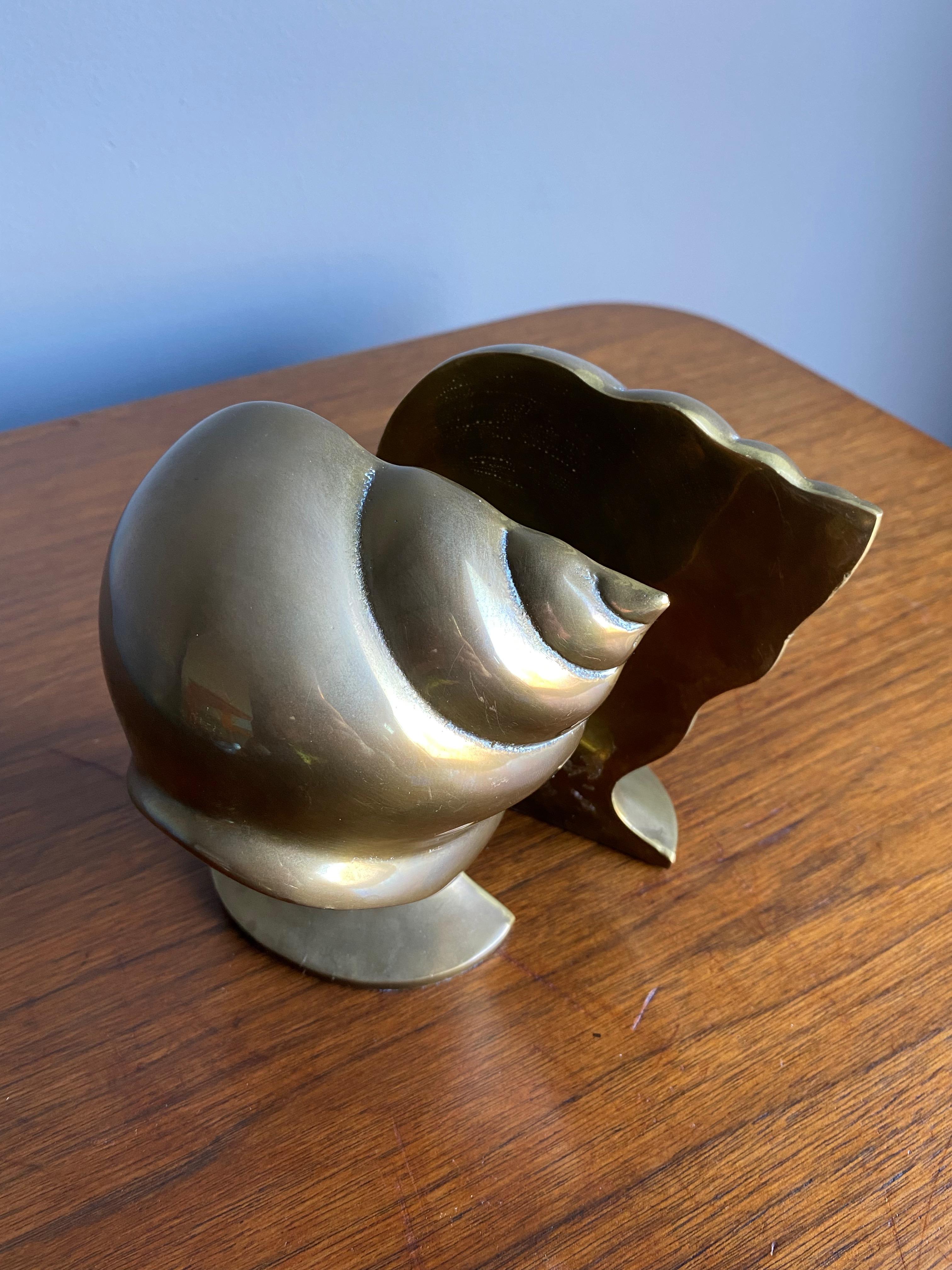 Vintage Brass Shell bookends, circa 1985.