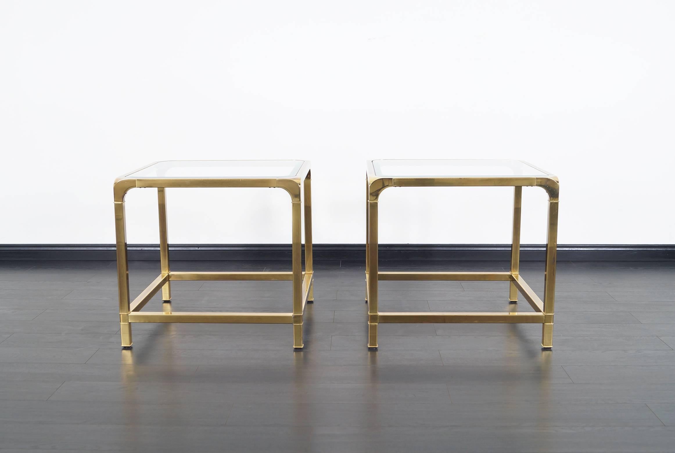 Fabulous pair of vintage brass side tables by Mastercraft.