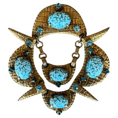 Broche vintage en laiton et pierre ollaire