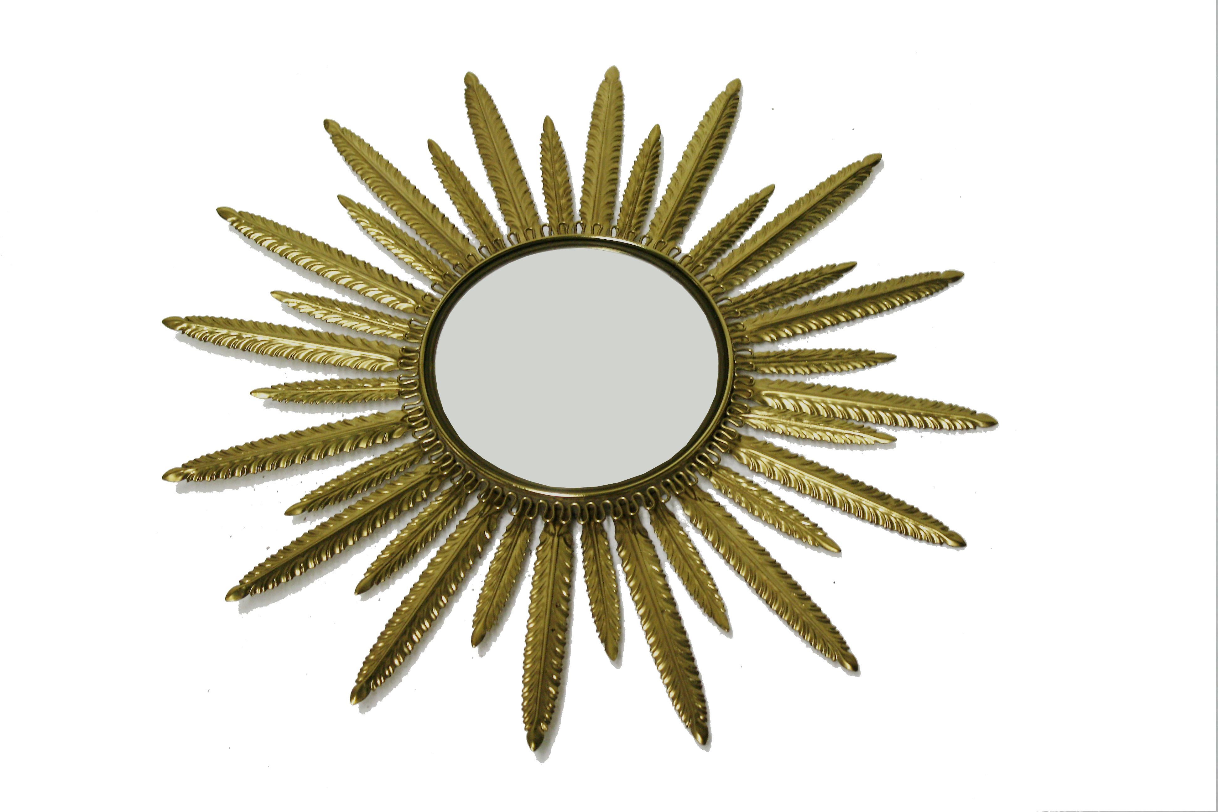 Midcentury brass sunburst or flower mirror with convex glass.

This mirror fits in most interiors and is a perfect add-on for a Regency style interior.

The mirror is made from patinated brass.

Good condition.

France - 1960s

Diameter: