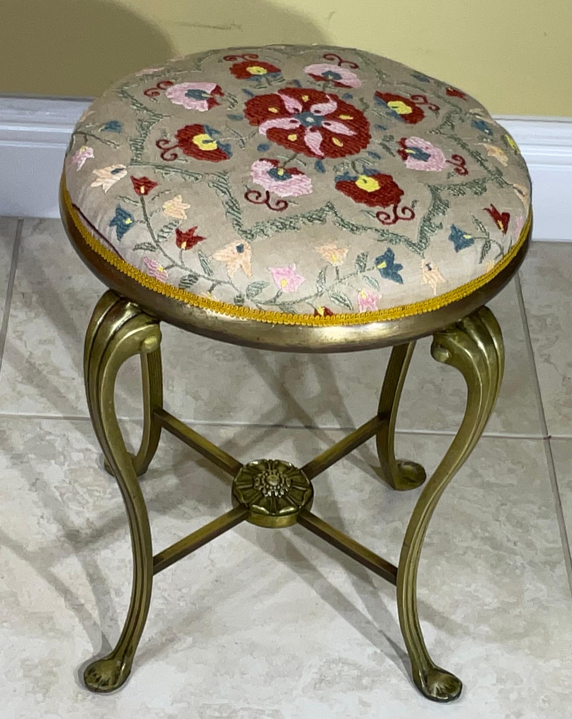 Exceptional vintage  foot stool made of solid brass  upholster with beautiful hand embroidery Suzani textile .
great object of art for display.
