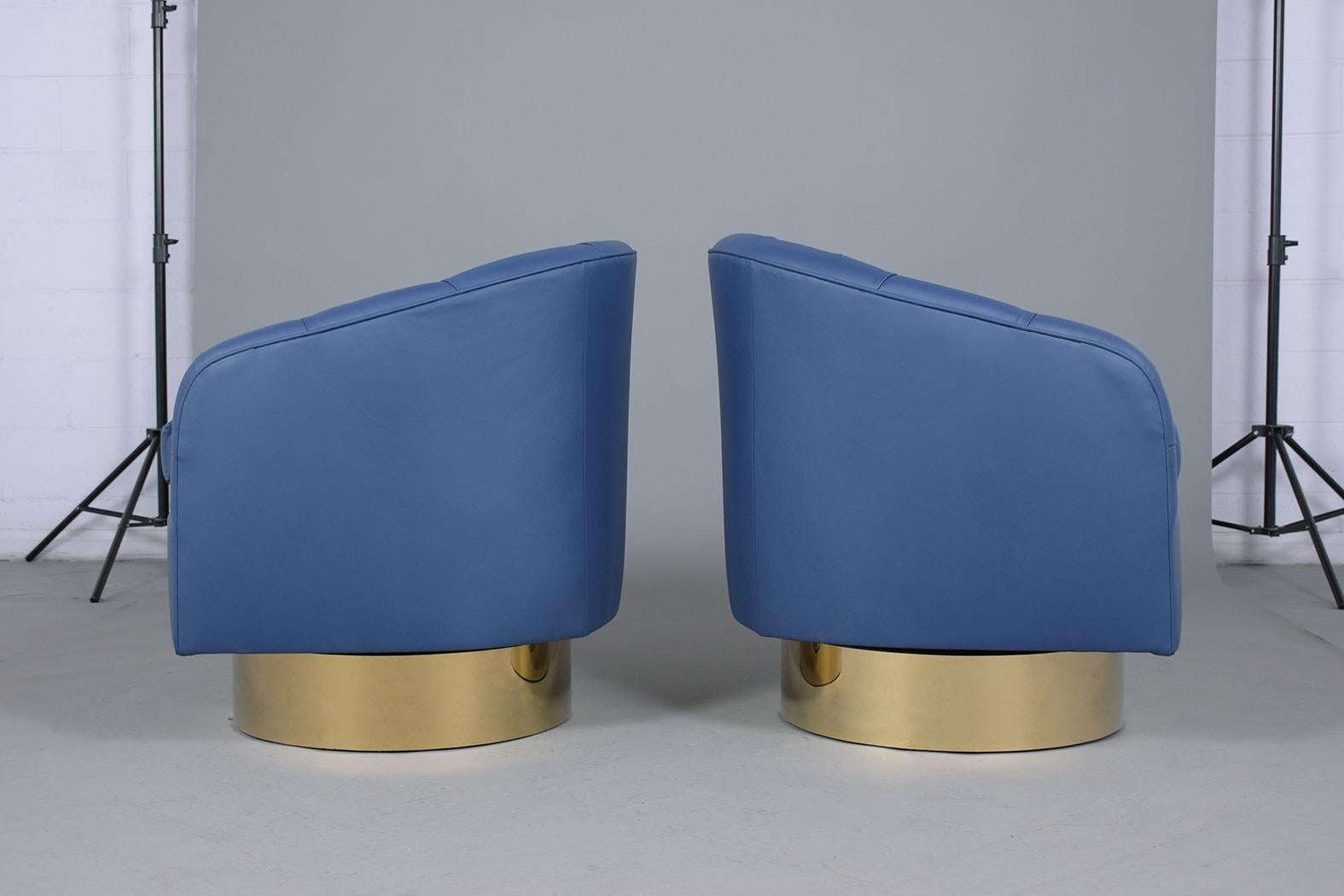 Late 20th Century Pair ofMilo Baughman-Inspired Vintage Brass Swivel Lounge Chairs in Blue Leather