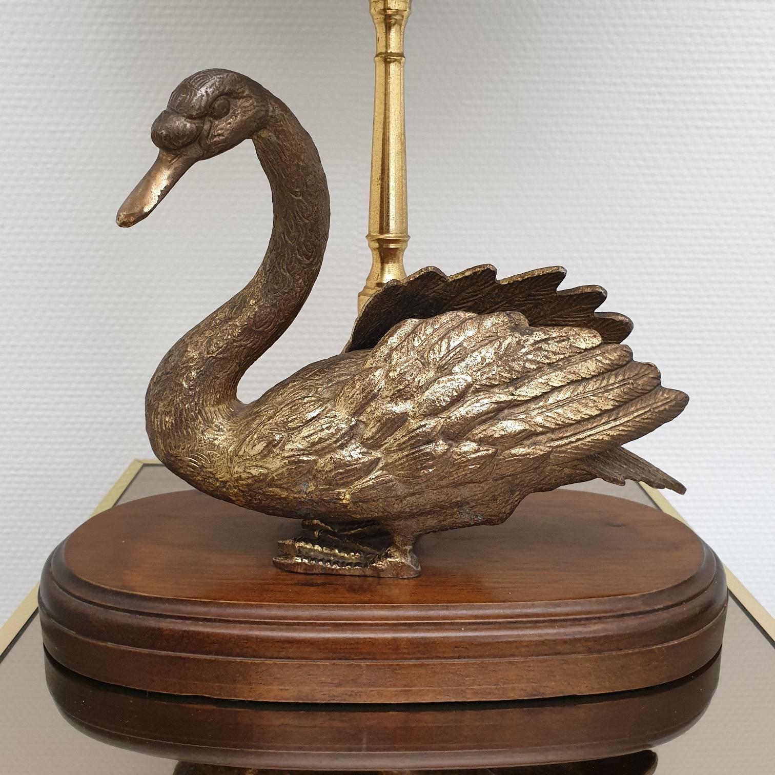 Vintage brass table lamp with brass duck, 1960s.
With the original oval shade.
In style of Maison Jansen.