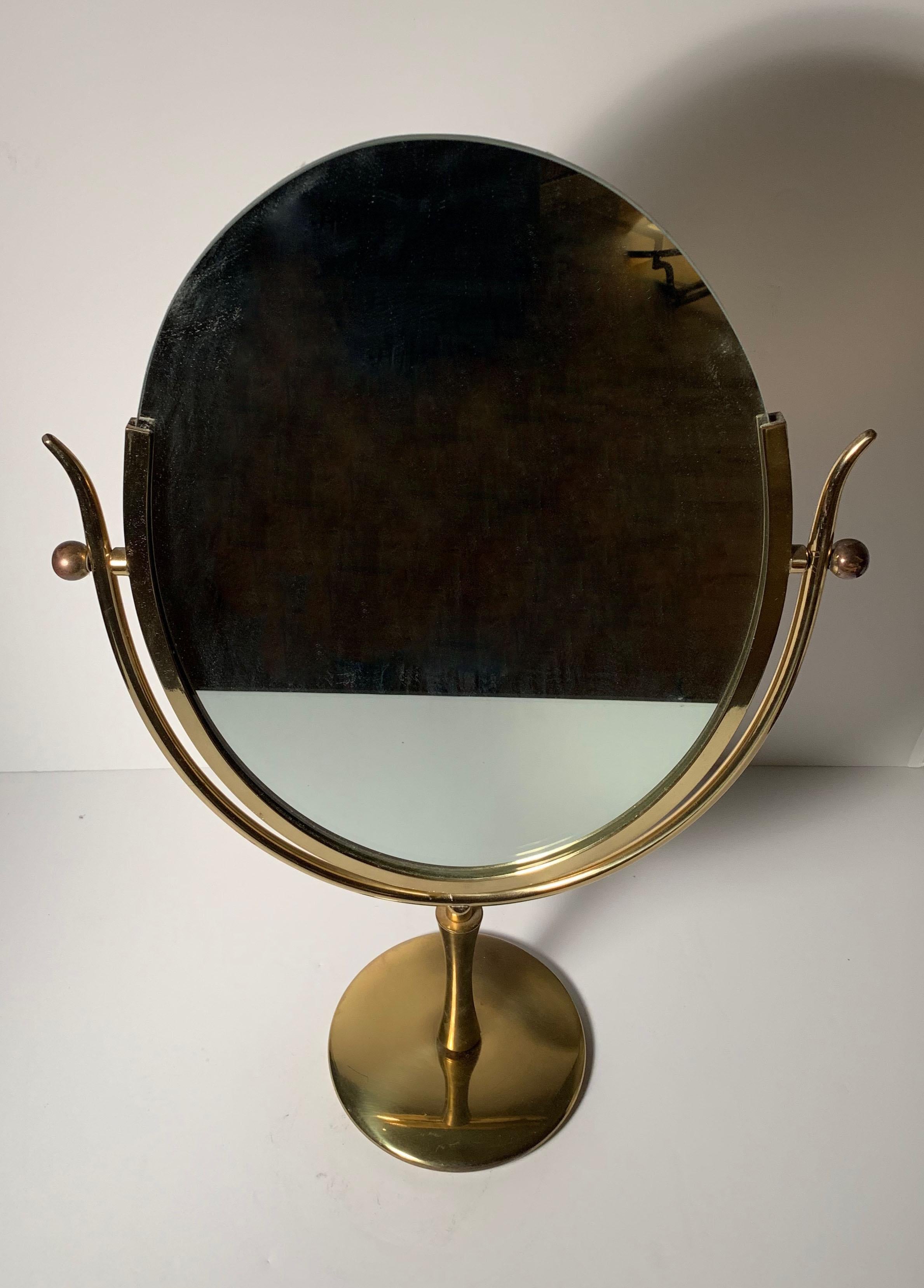 Vintage brass table mirror attributed to Charles Hollis Jones.