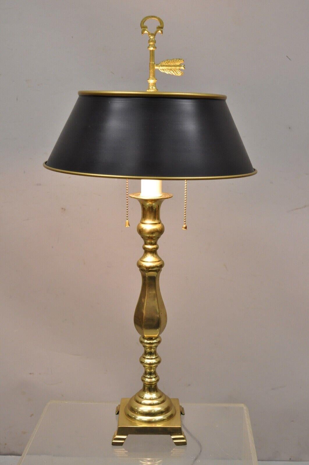 Vintage brass tole metal black tole shade candlestick desk table lamp. Item features twin light sockets, brass frame, quality craftsmanship, great style and form. Circa late 20th century. Measurements: 29