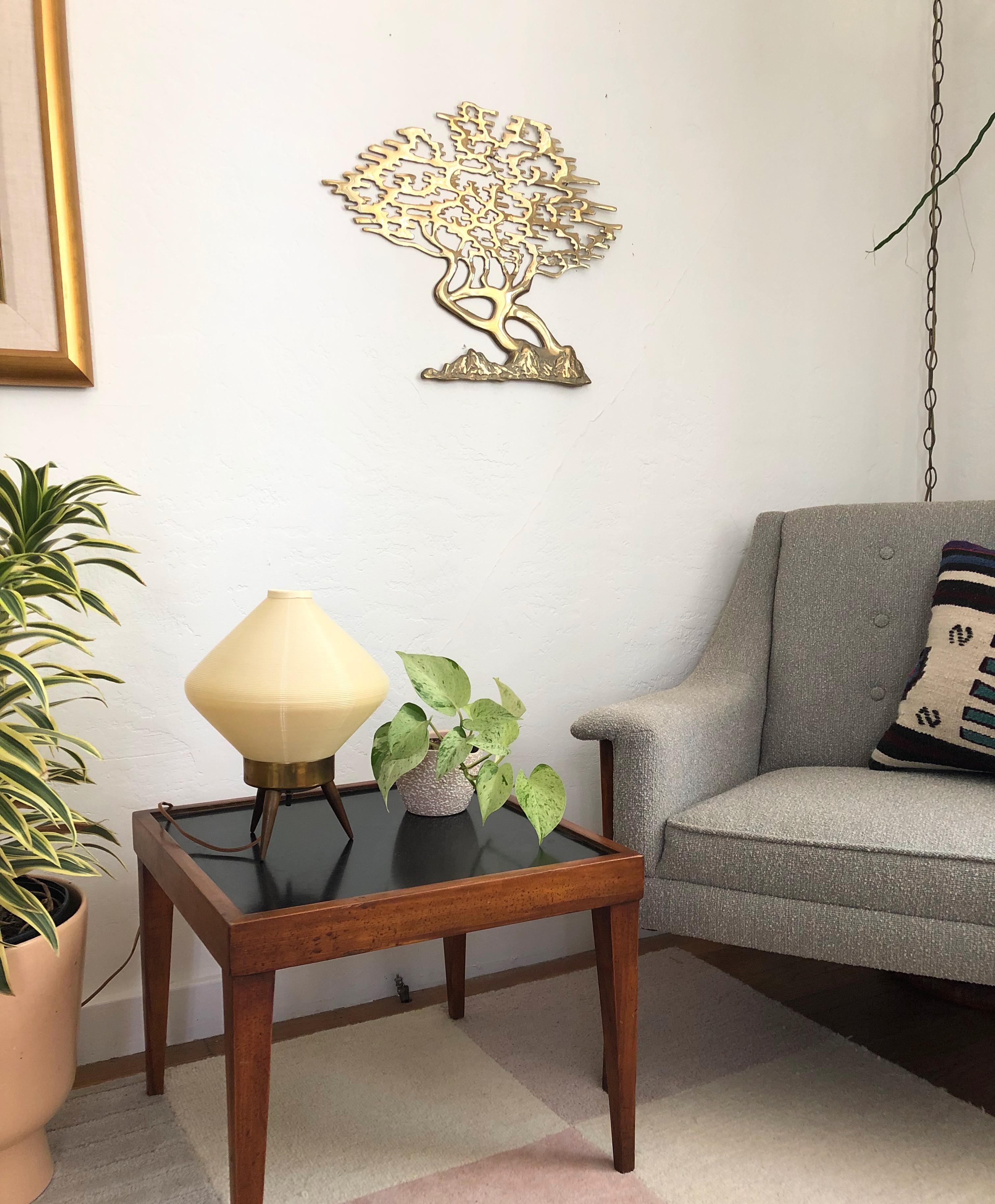 A beautiful vintage brass wall sculpture of a tree. Beautiful stylized detailing of the leaves.
 