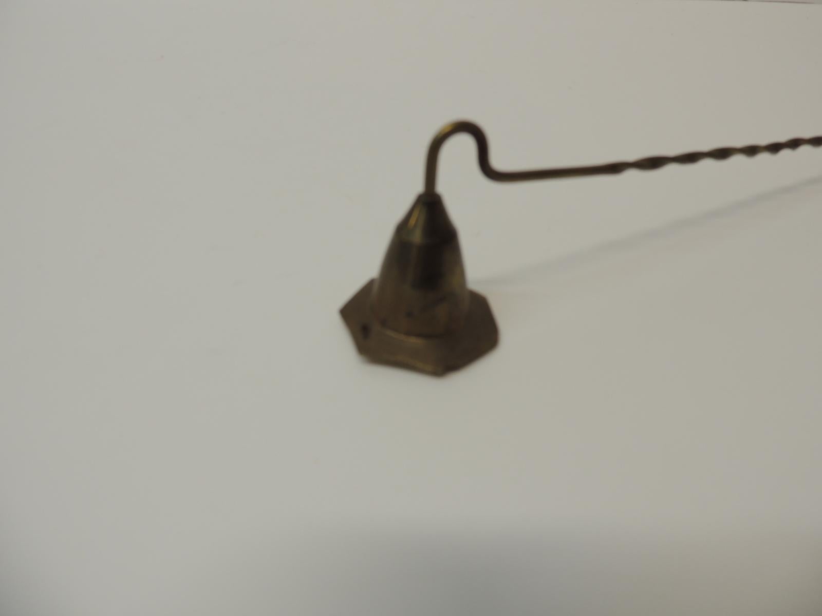 Vintage brass trumpet shape candle snuffer
With twisted handle shape.
Size: 10.5