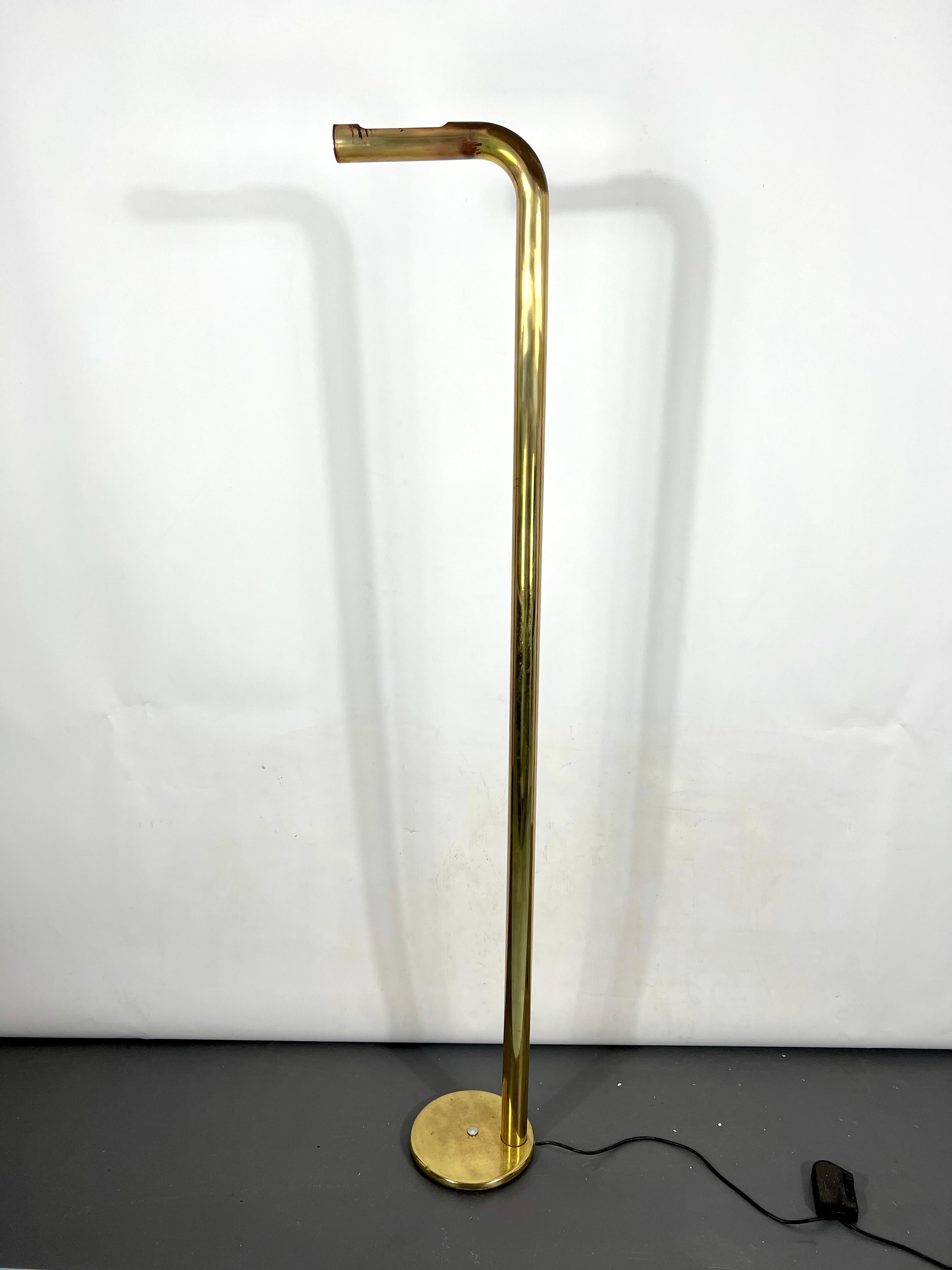 Vintage condition with evident trace of age and use on the brass for this halogen floor lamp produced in Italy during the 70s and made from solid brass. Full working with EU standard, adaptable on demand for USA standard.