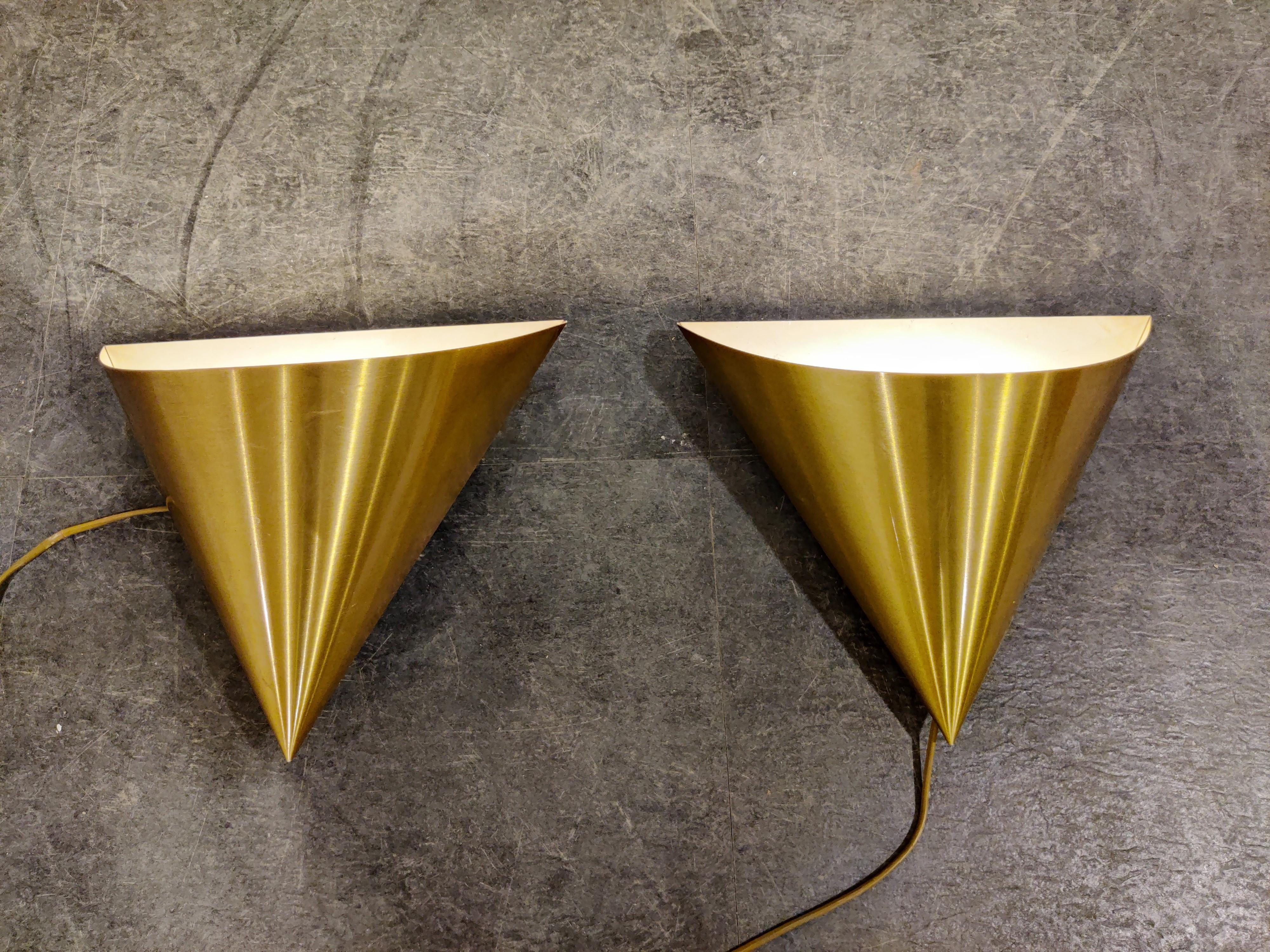 Conical brass wall lamps designed by Dieter Witte for Staff Leuchten.

They have a light enamel coating on the inside to create a soft light.

This set was salvaged from a Discotheque.

All in good condition.

A set of 6 can make a beautiful