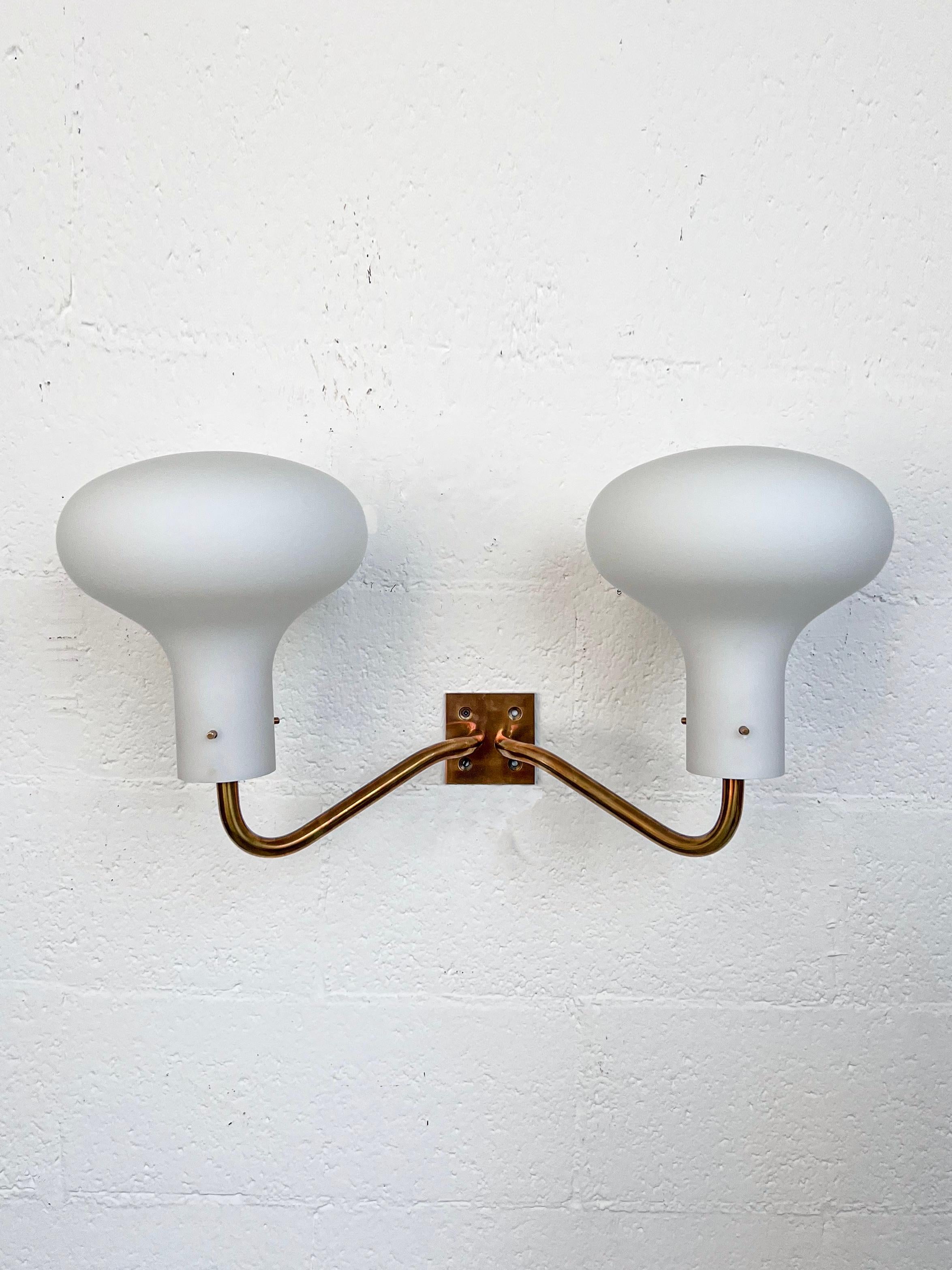  Vintage Italian LP12 sconce by Ignazio Gardella, brass frame and opaline glass mushroom-shaped lightshades. Some collectors indeed nickname these lamps 