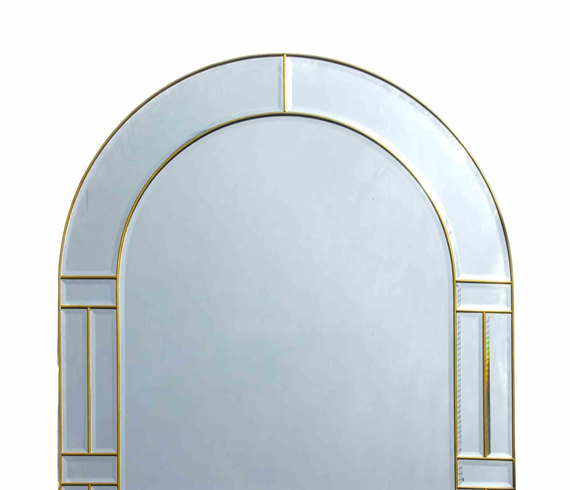 Specchio da parete in ottone vintage realizzato in Italia negli anni '70.

Ottime condizioni.