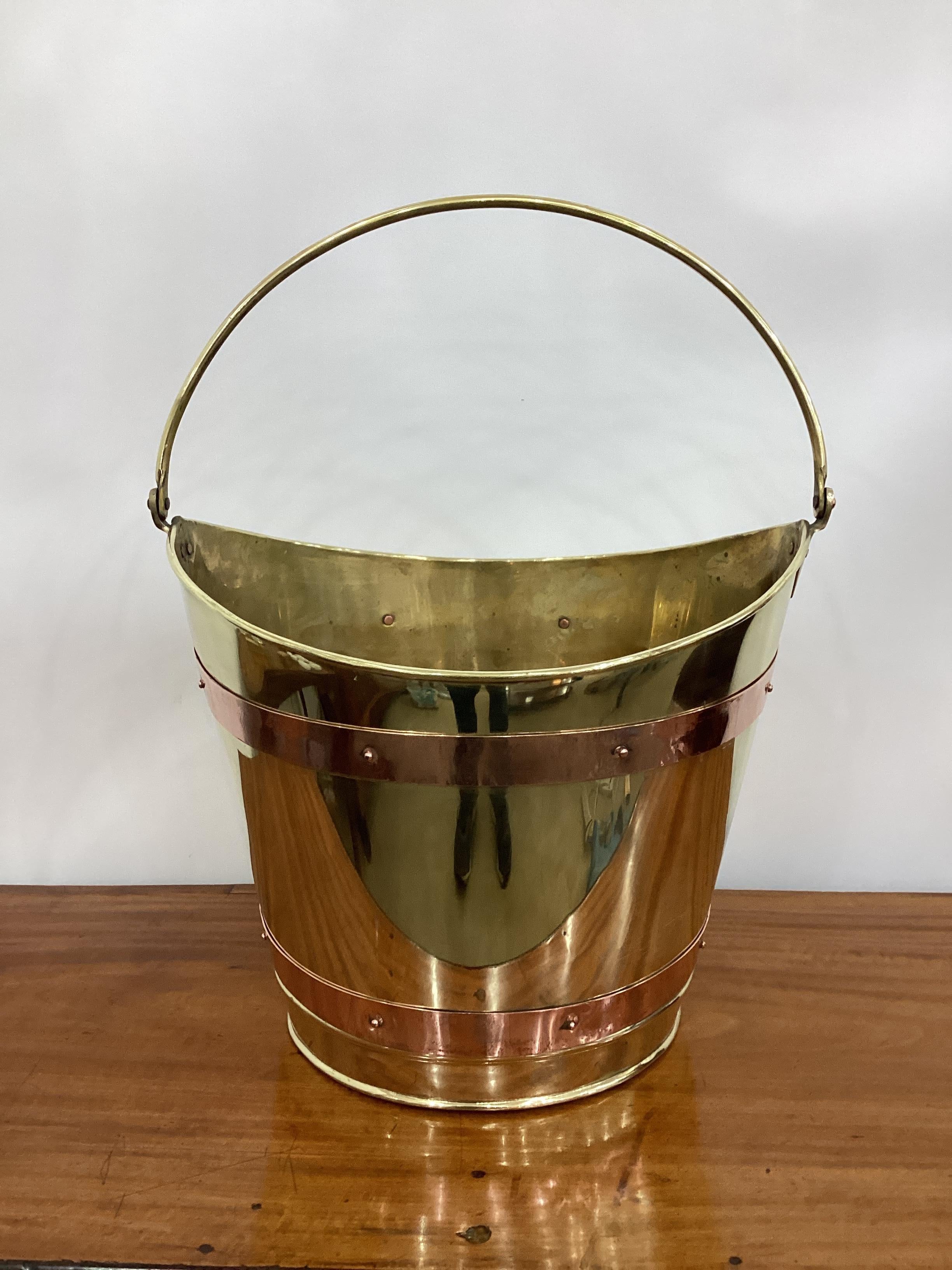 Vintage Brass with Copper Banding Navette Bucket. Perfect for a plant or besides a fireplace for kindling.
