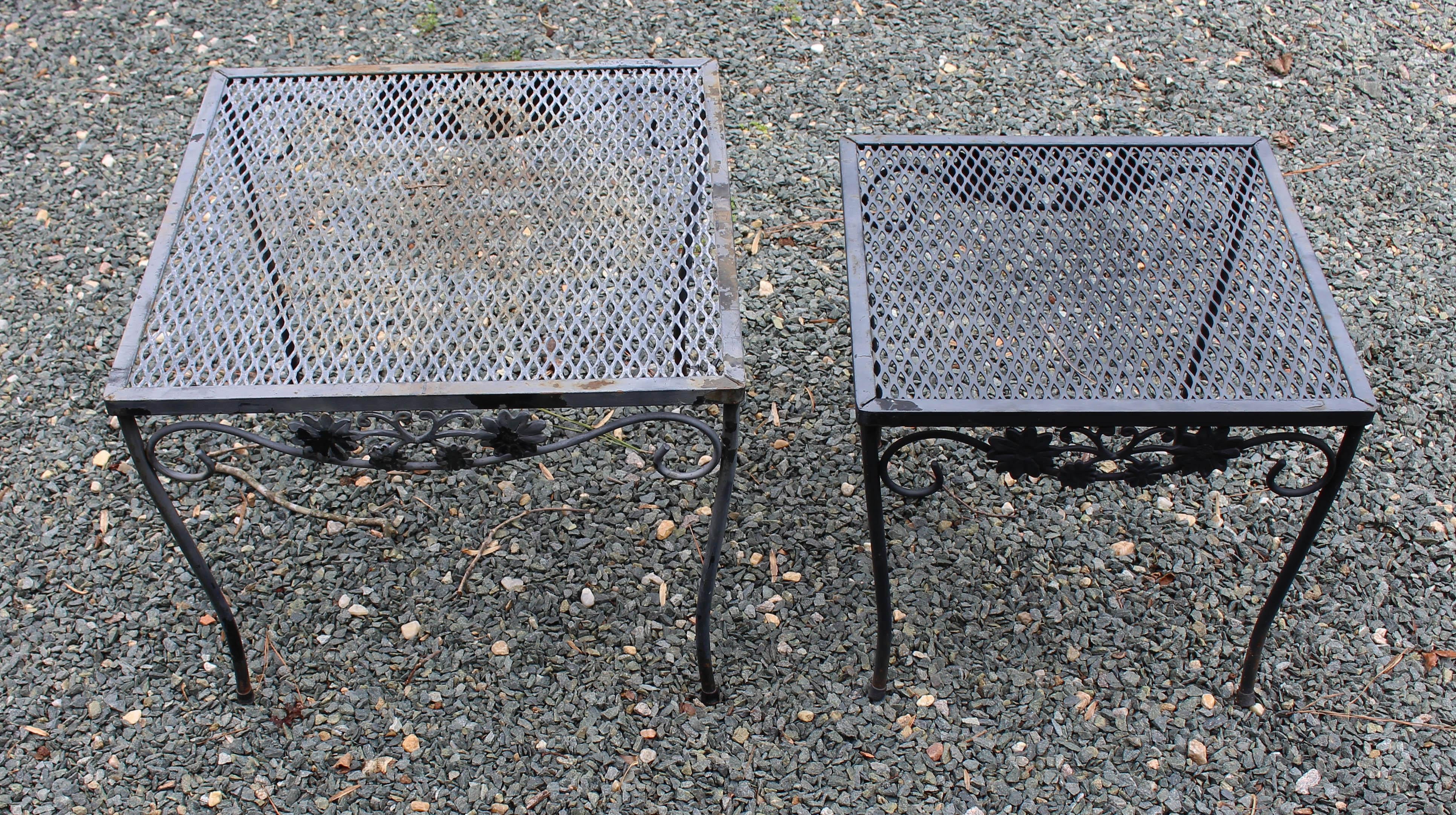 Vintage Woodard set of two outdoor nesting tables, Briarwood pattern, not labeled. One well weathered.
Larger: 19.5