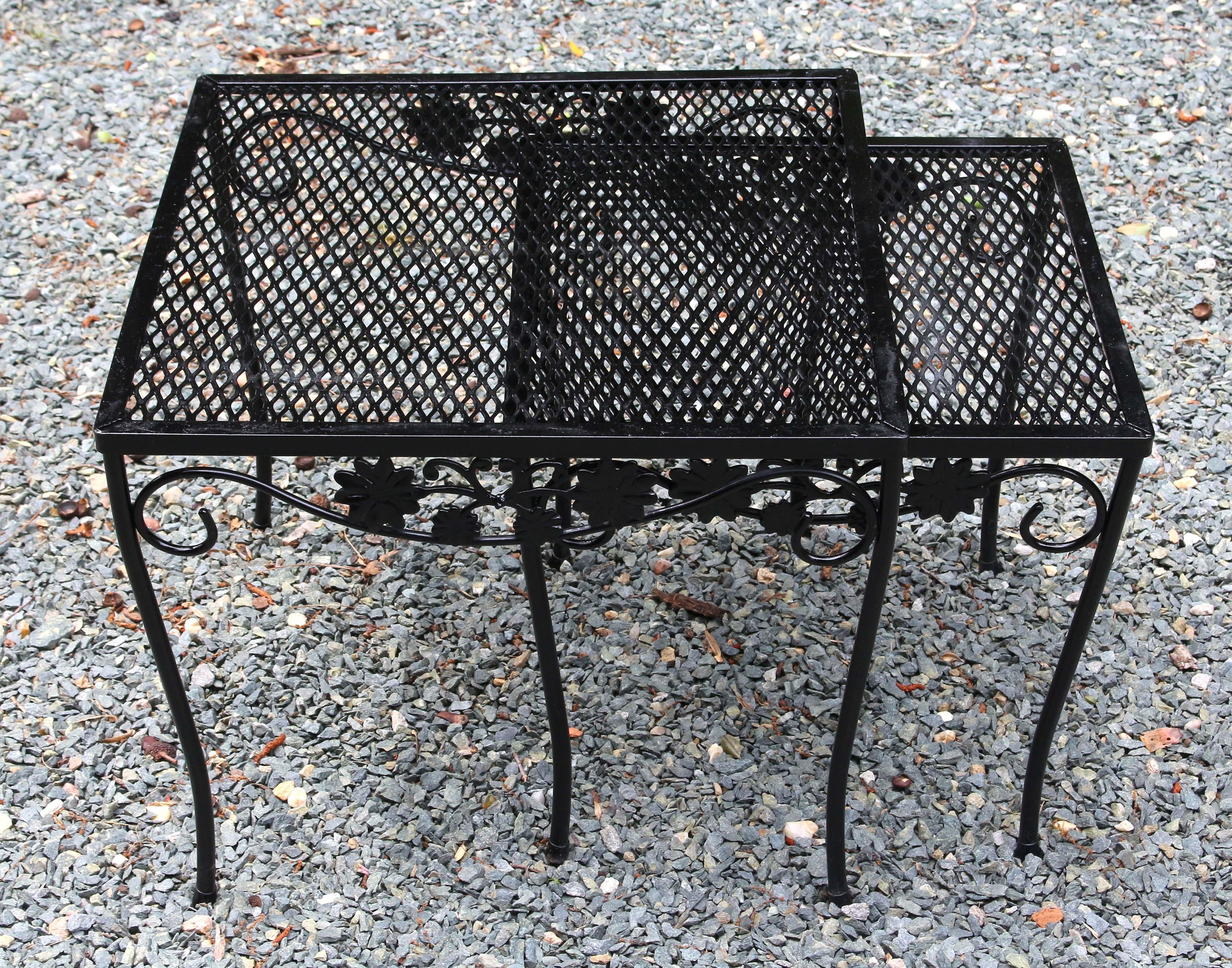 Vintage Woodard set of two outdoor nesting tables, Briarwood pattern, not labeled. Repainted surfaces.
Larger: 19.5