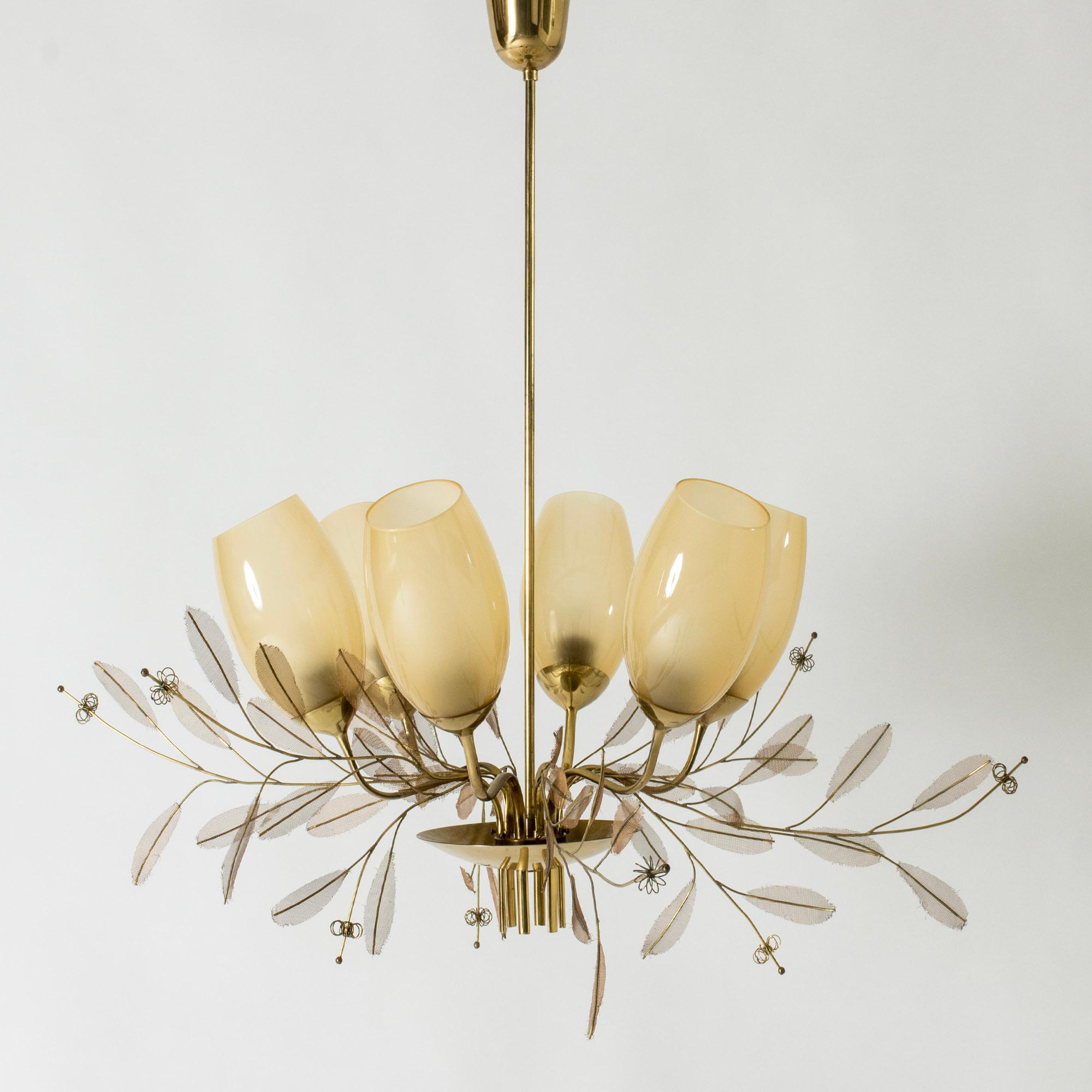 Stunning “Bridal Bouquet” chandelier by Paavo Tynell. Six lamp shades in opaline glass on a brass frame decorated with beautiful brass applications in the form of flower buds and leaves.